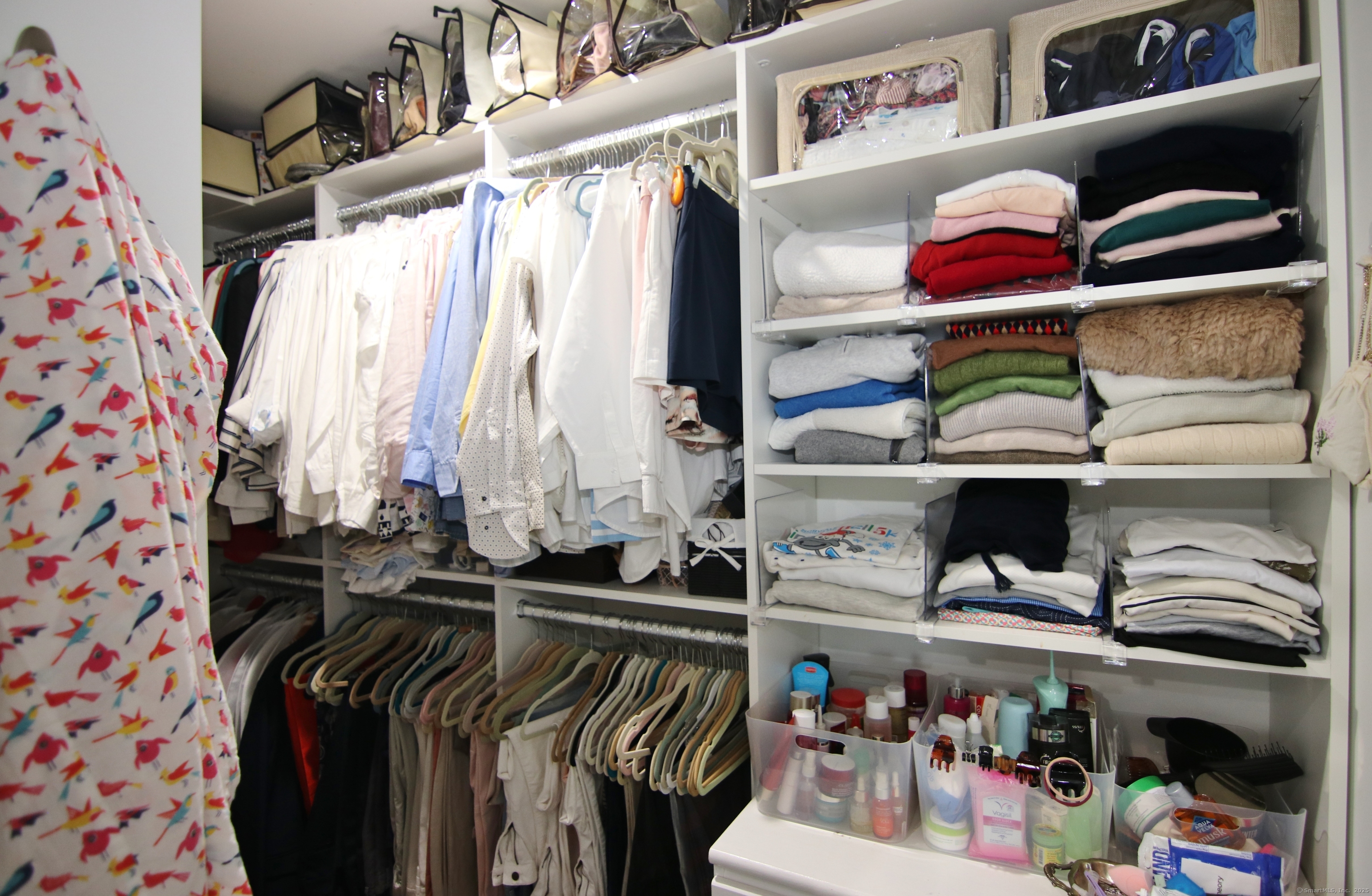 30 Possum Circle Norwalk, CT 06854 - Photo 14 of 23 a view of walk in closet with clothes and shoes