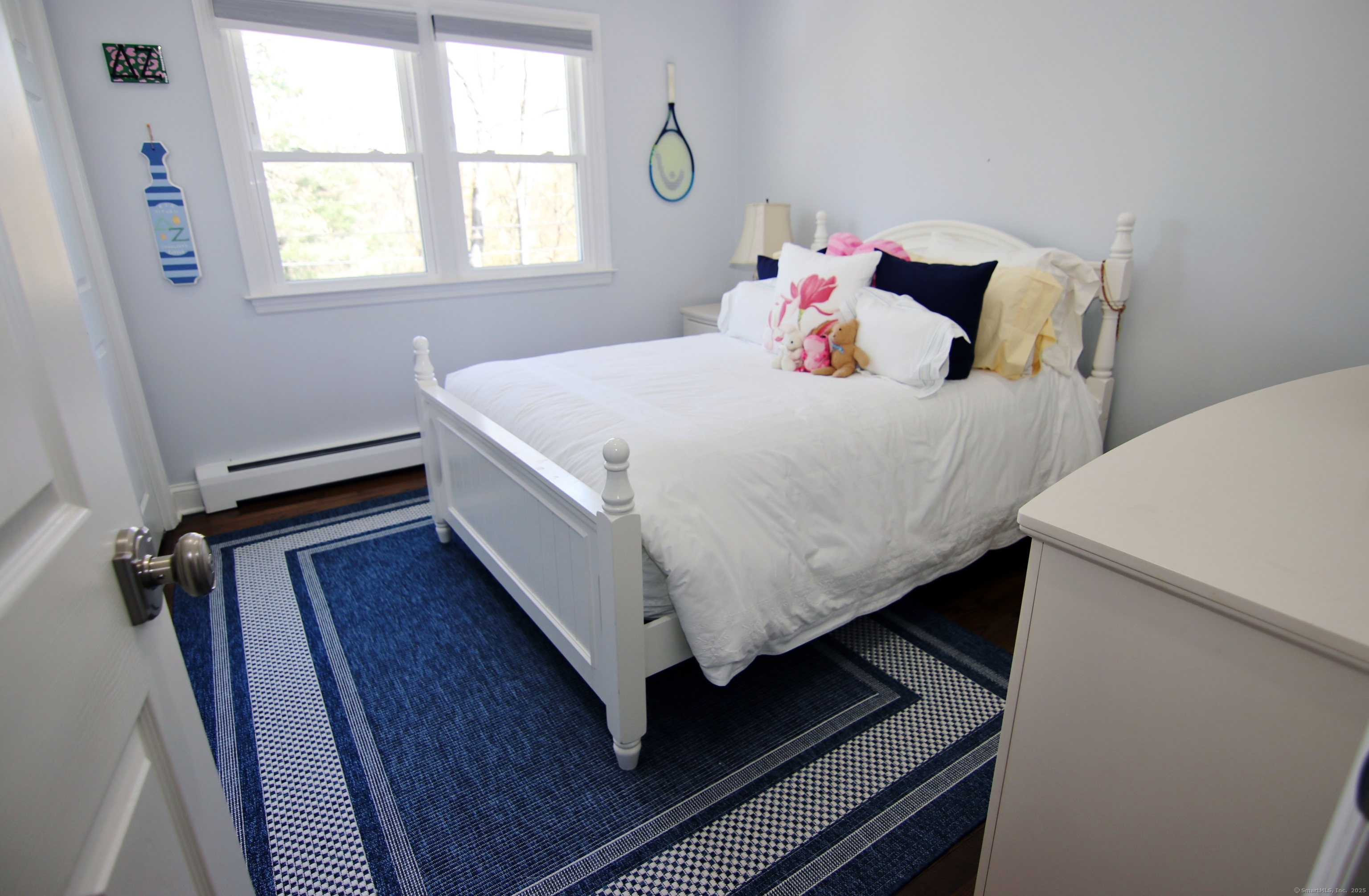 30 Possum Circle Norwalk, CT 06854 - Photo 19 of 23 a bedroom with bed and window