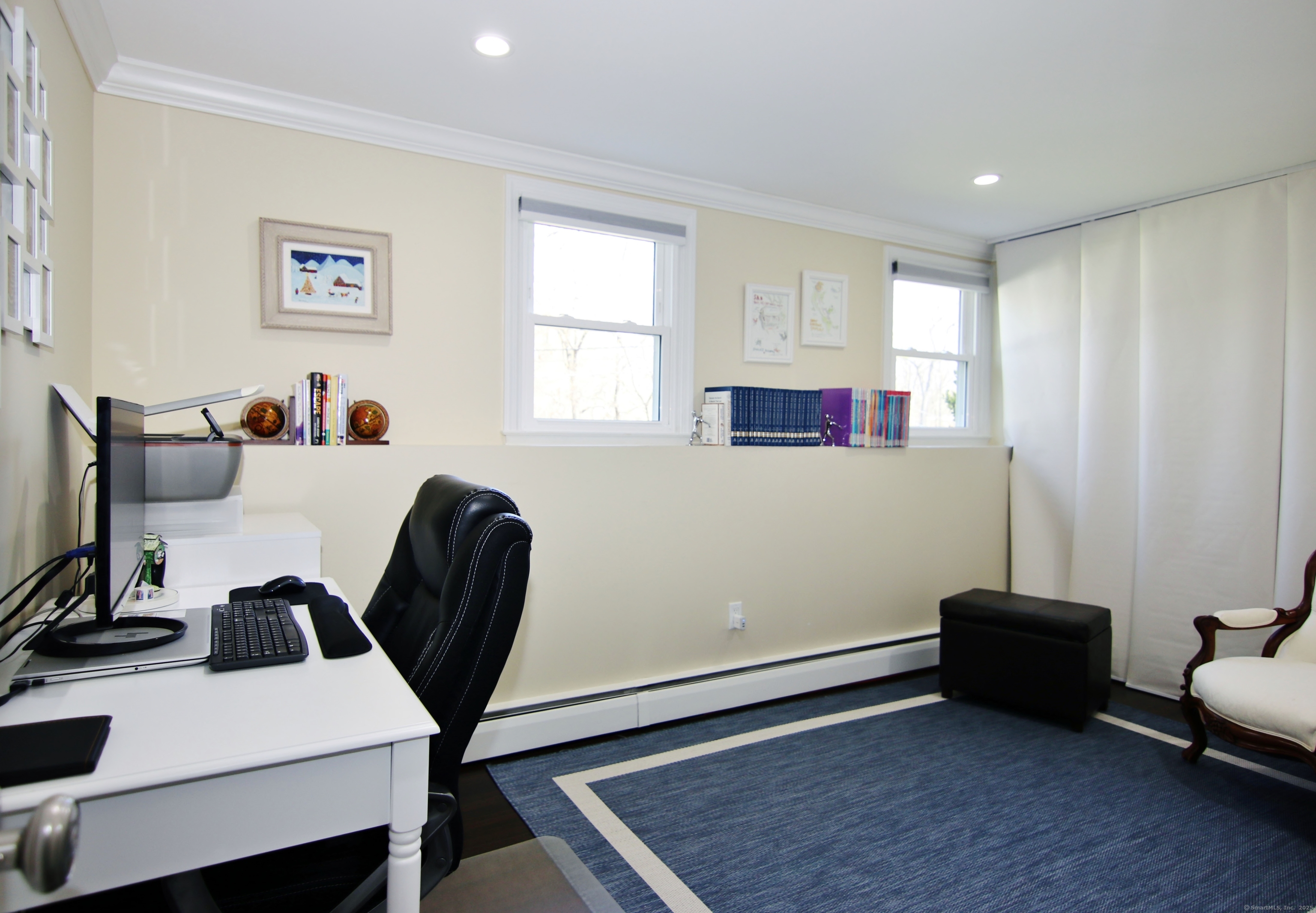 30 Possum Circle Norwalk, CT 06854 - Photo 21 of 23 a view of a workspace with furniture and a window