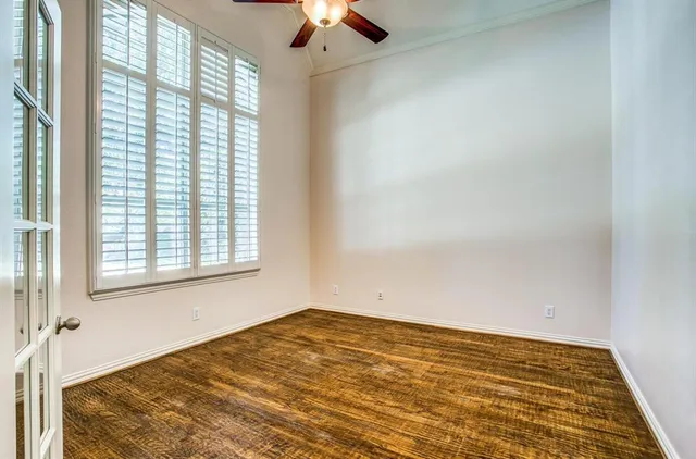 a view of an empty room and window