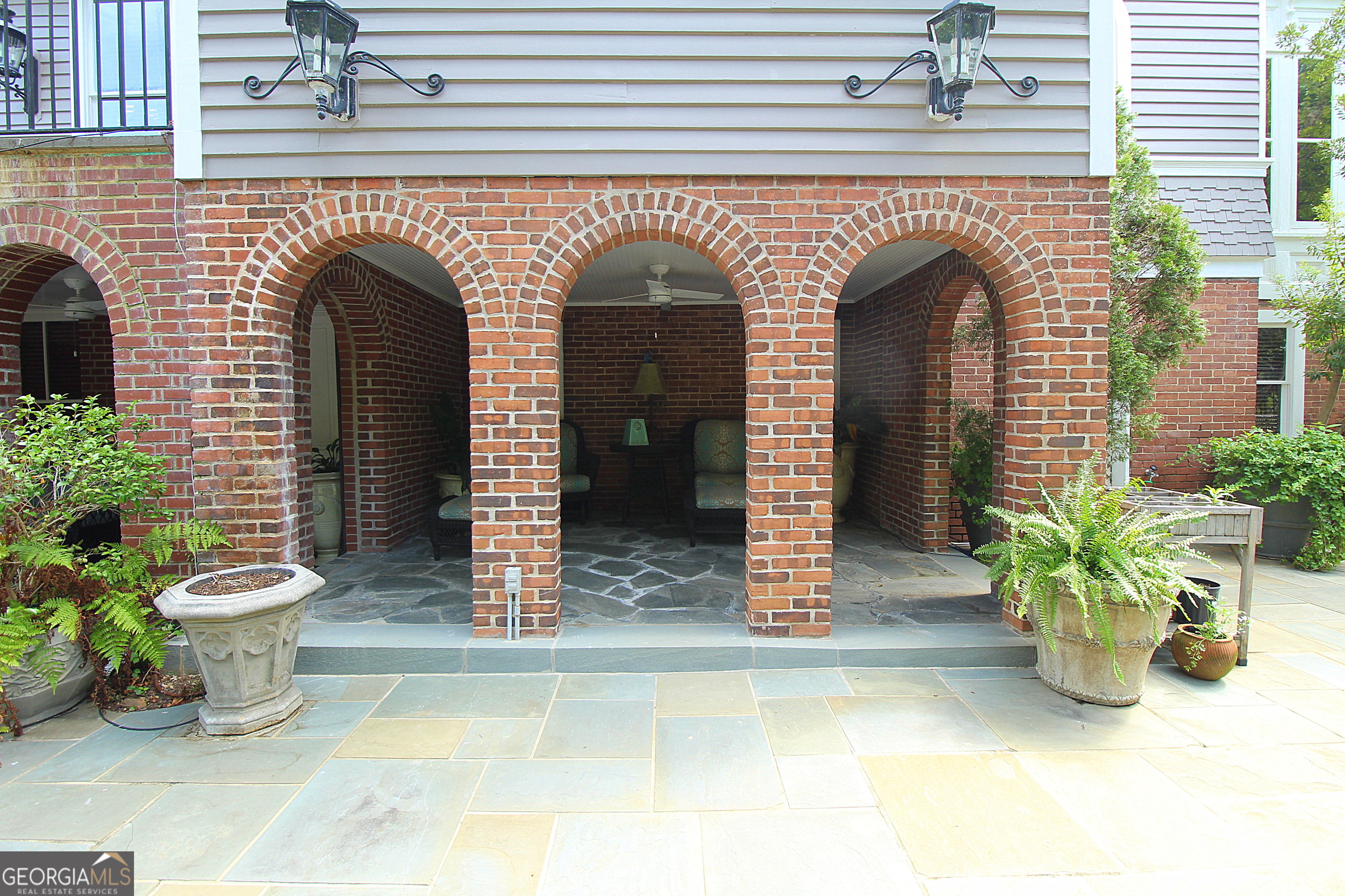 320 East 3rd Avenue Rome, GA 30161 - Photo 125 of 152 a front view of a house with potted plants