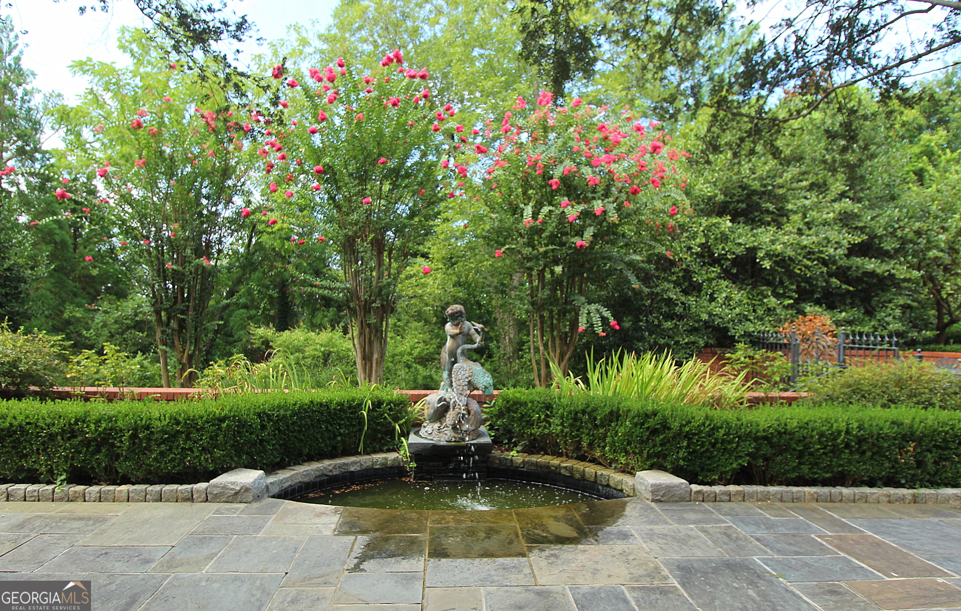 320 East 3rd Avenue Rome, GA 30161 - Photo 139 of 152 a view of a fountain in front of a house with a fountain