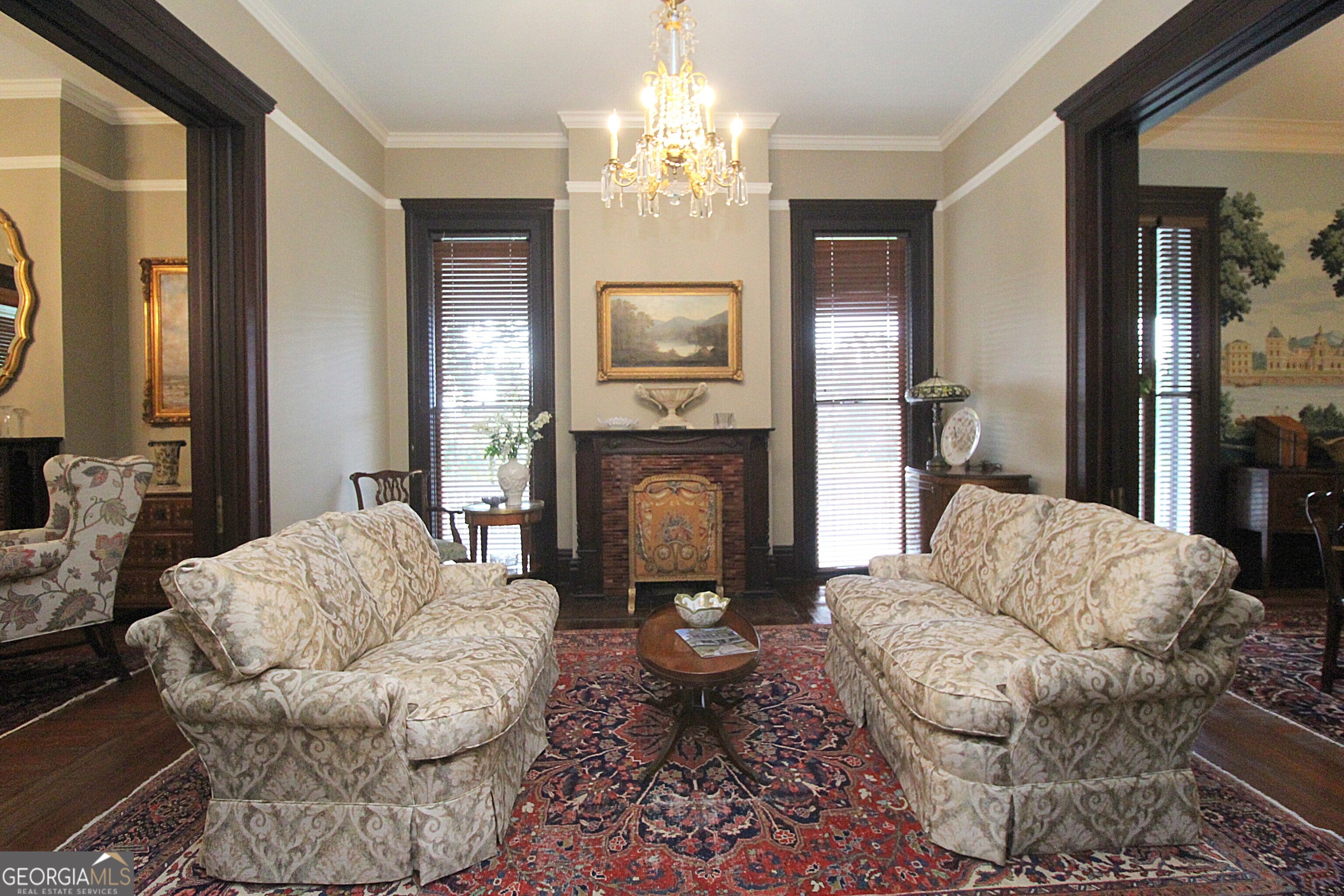 320 East 3rd Avenue Rome, GA 30161 - Photo 31 of 152 a living room with furniture and a chandelier