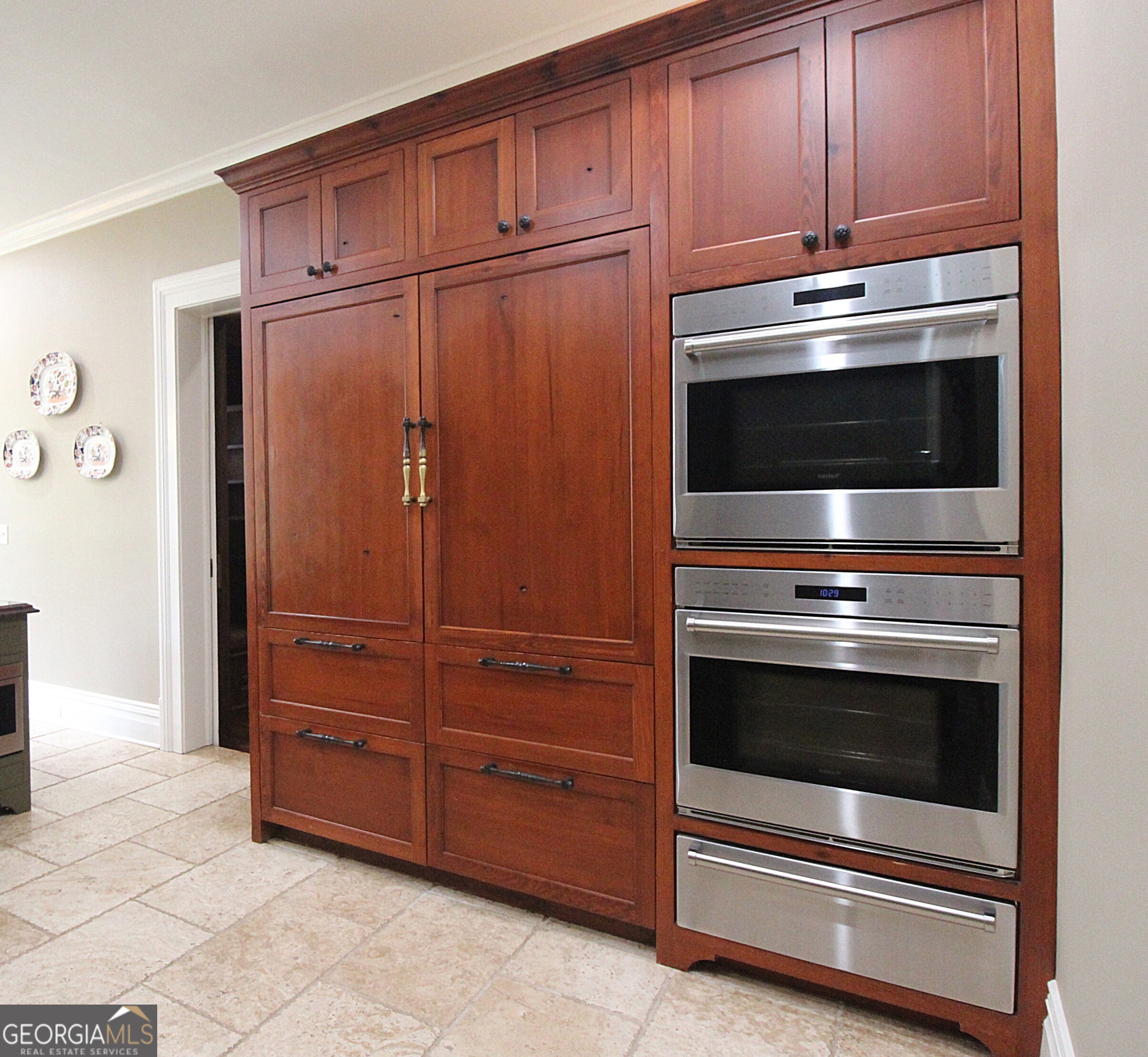 320 East 3rd Avenue Rome, GA 30161 - Photo 45 of 152 a kitchen with granite countertop wooden cabinets and stainless steel appliances