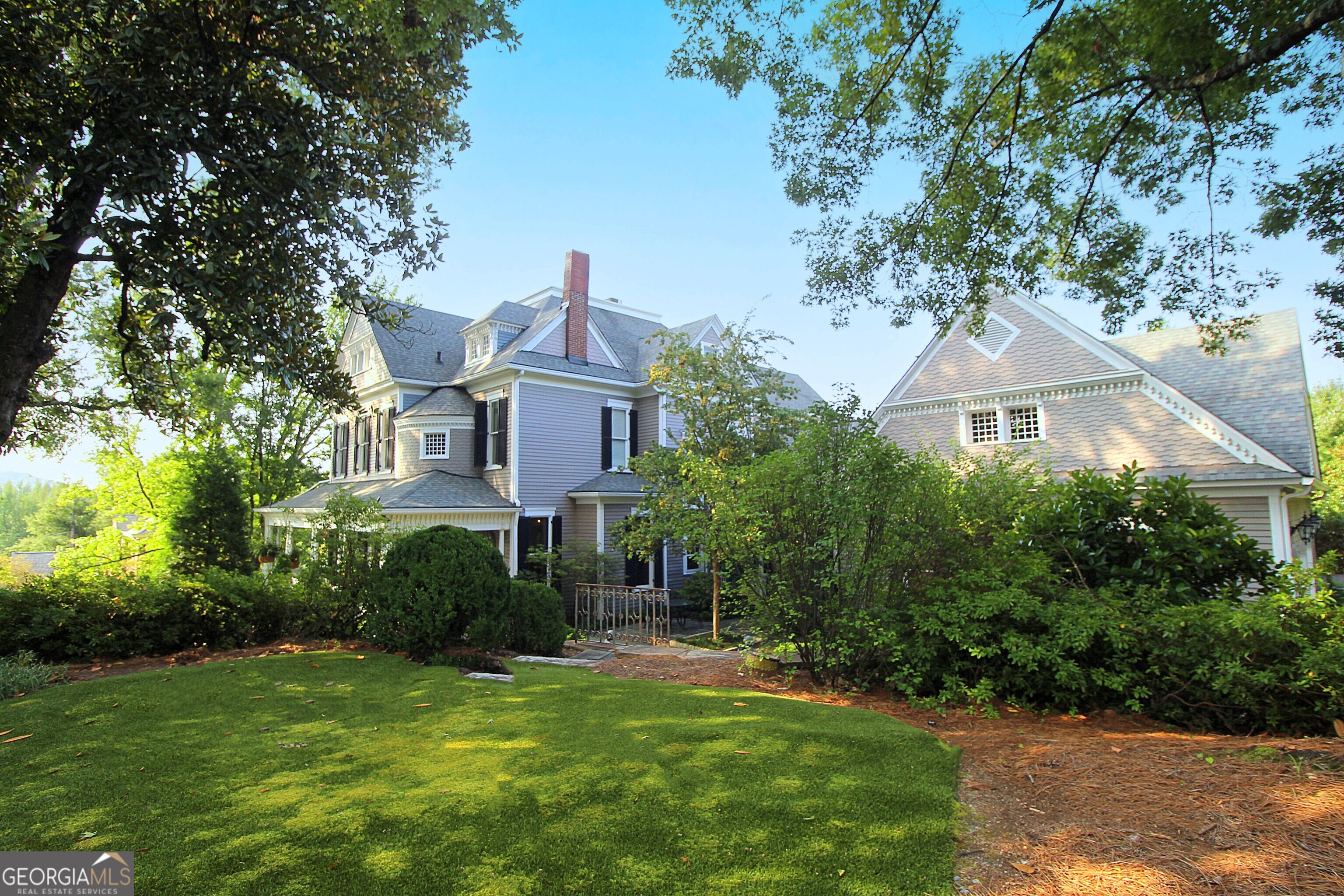 320 East 3rd Avenue Rome, GA 30161 - Photo 6 of 152 a front view of a house with a yard and trees