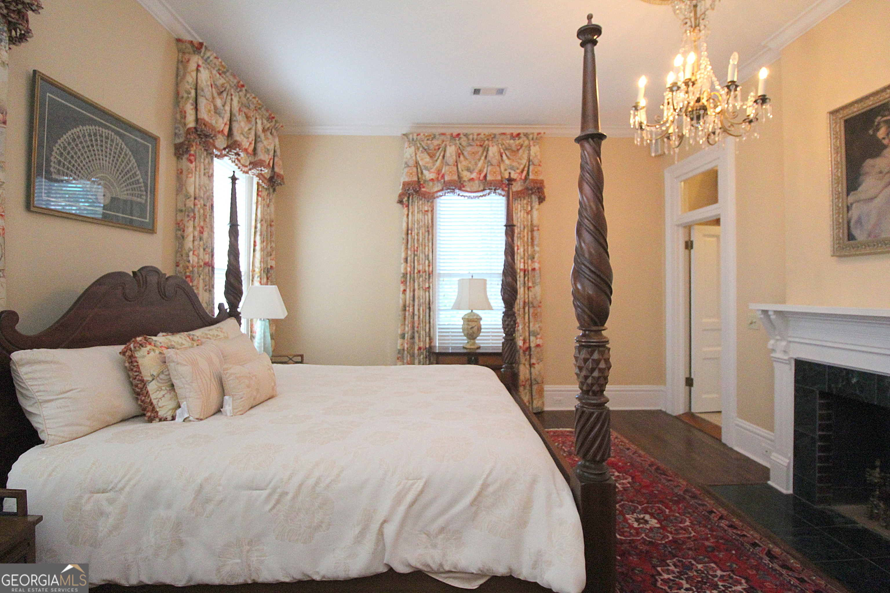 320 East 3rd Avenue Rome, GA 30161 - Photo 67 of 152 a bedroom with a bed and a fireplace