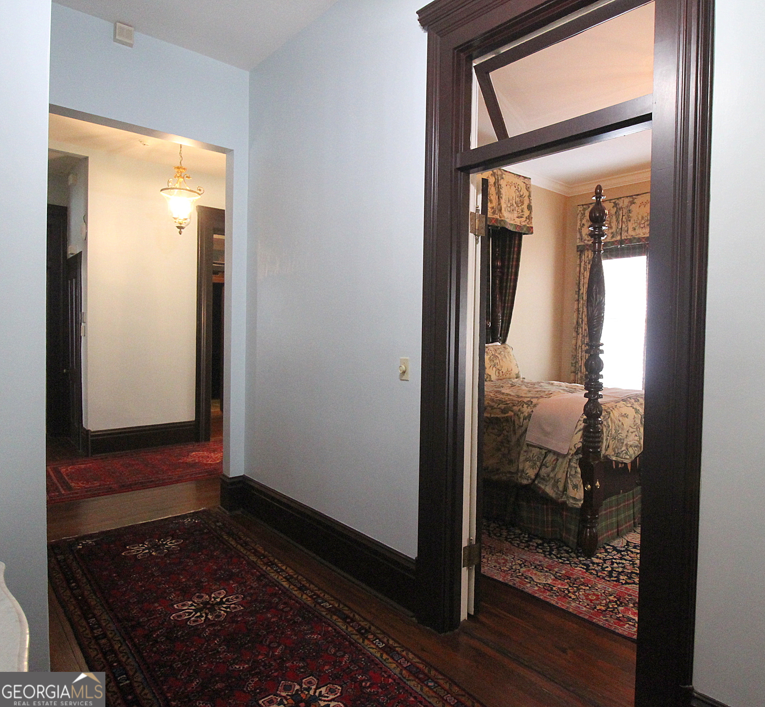 320 East 3rd Avenue Rome, GA 30161 - Photo 89 of 152 a view of a hallway with wooden floor and a bedroom