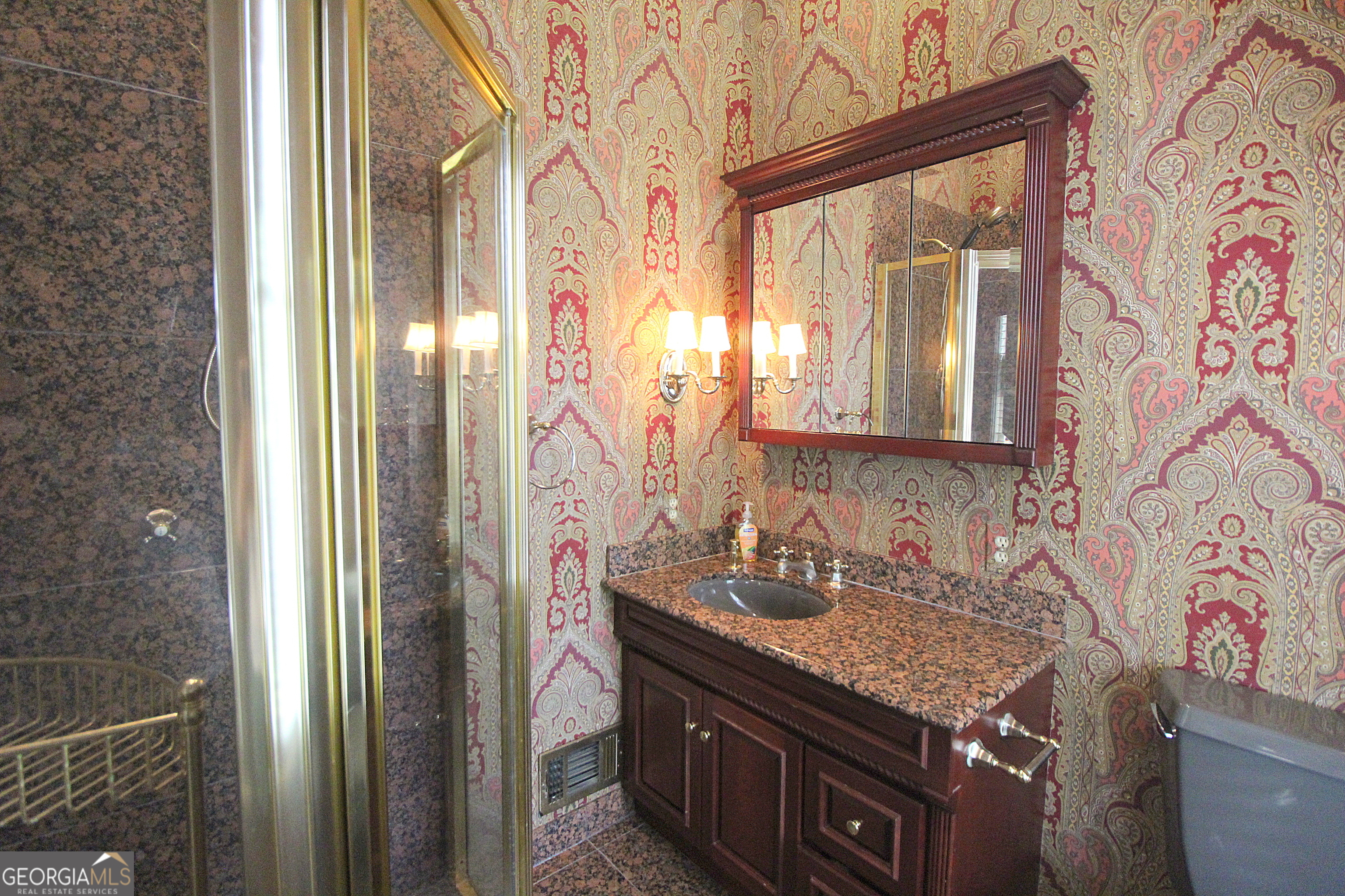 320 East 3rd Avenue Rome, GA 30161 - Photo 92 of 152 a bathroom with a granite countertop sink and a mirror