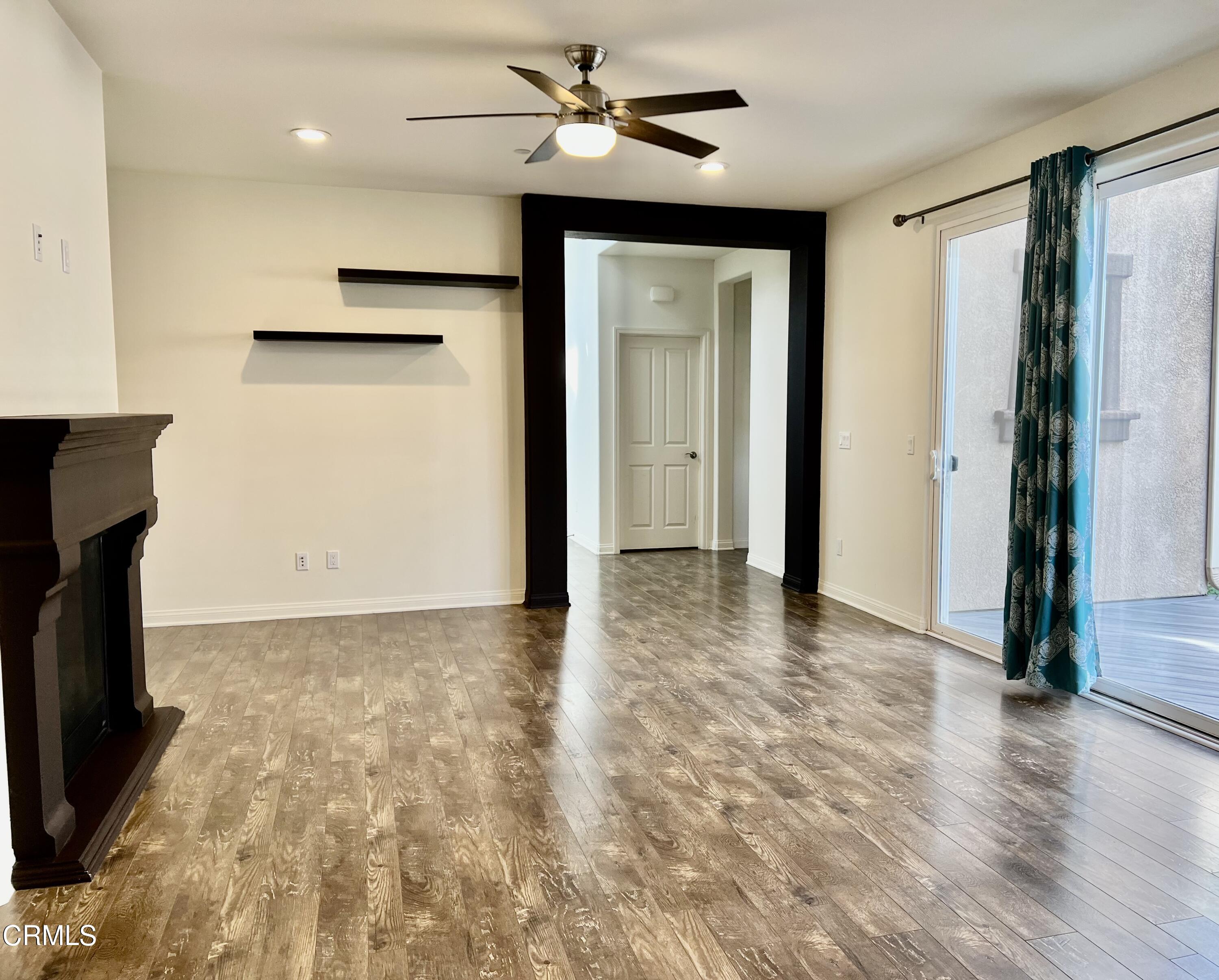 668 Owens River Drive Oxnard, CA 93036 - Photo 4 of 10 wooden floor in an empty room with a window