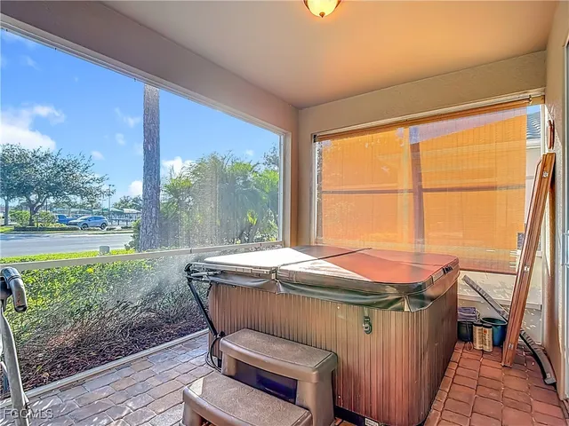 a dining room with a table and chairs