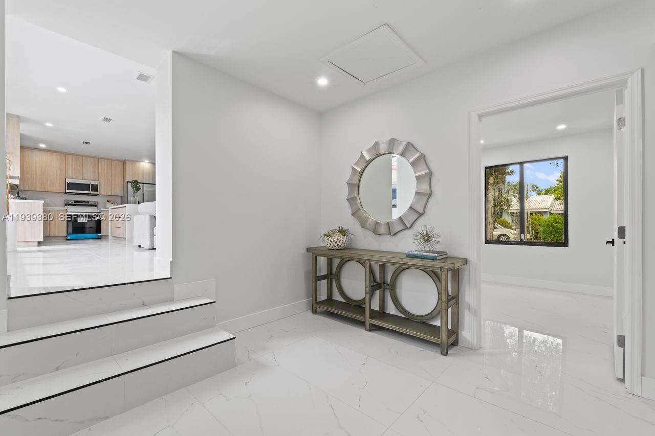 1741 Southwest 17th Court Miami, FL 33145 - Photo 14 of 19 a view of living room washer and dryer