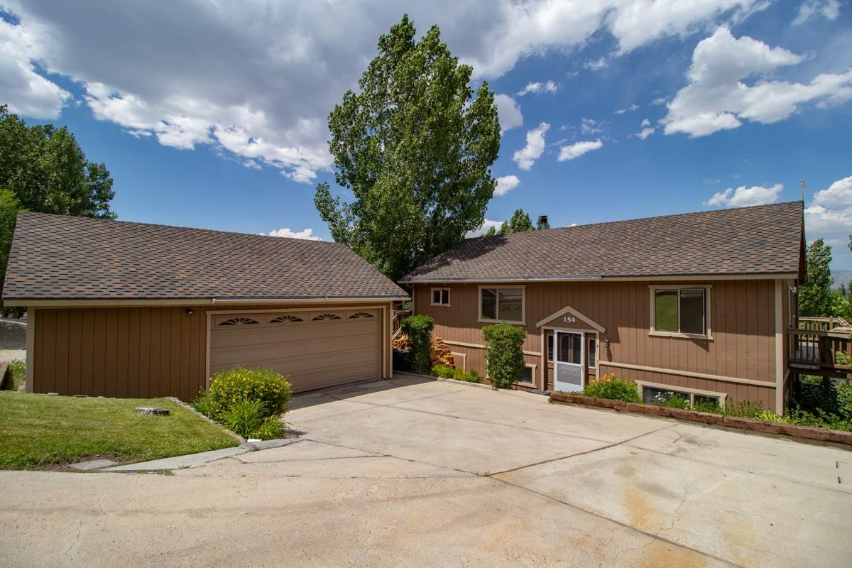154 South Landing Road Crowley Lake, CA 93546 - Photo 1 of 27 a front view of a house with garden