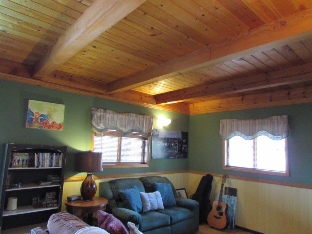 154 South Landing Road Crowley Lake, CA 93546 - Photo 19 of 27 a living room with furniture and a large window