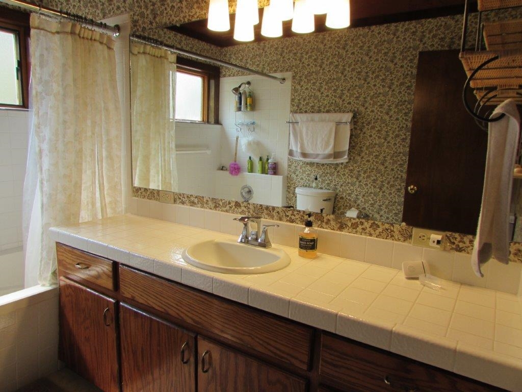 154 South Landing Road Crowley Lake, CA 93546 - Photo 20 of 27 a bathroom with a sink and a mirror