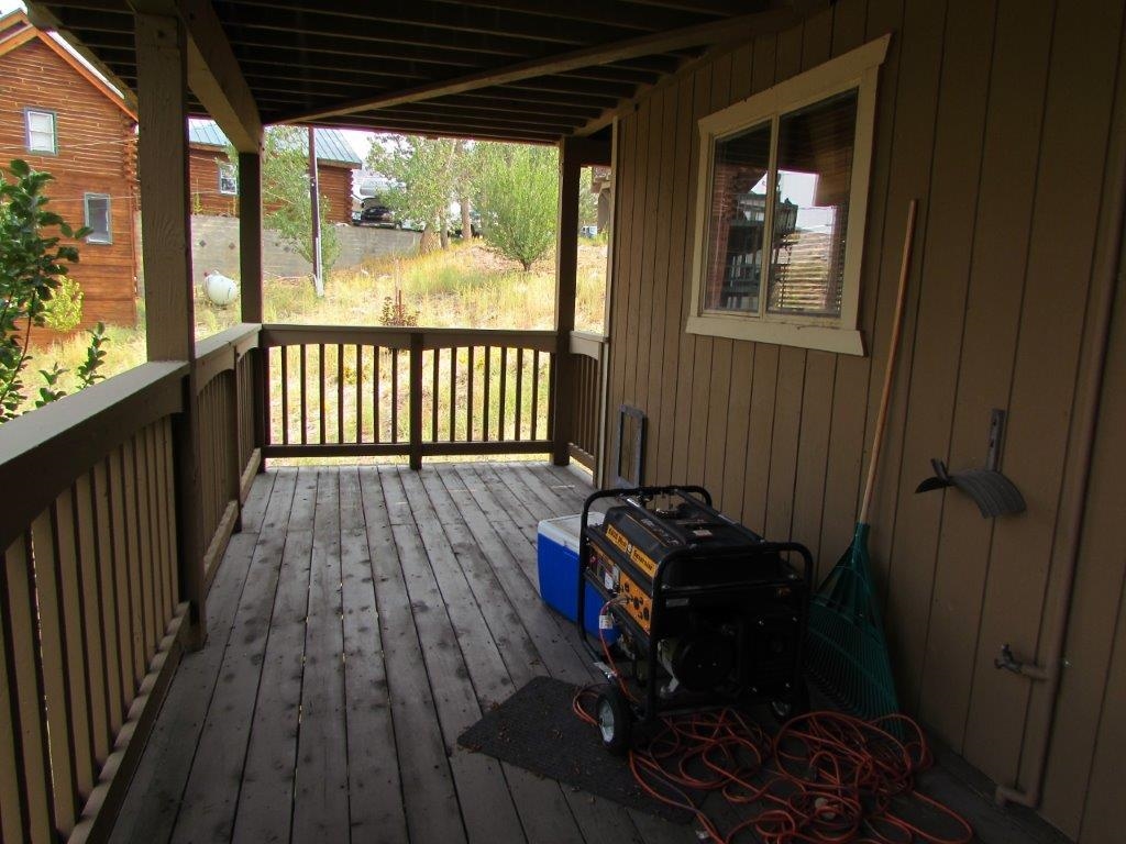 154 South Landing Road Crowley Lake, CA 93546 - Photo 24 of 27 a view of a balcony with wooden floor