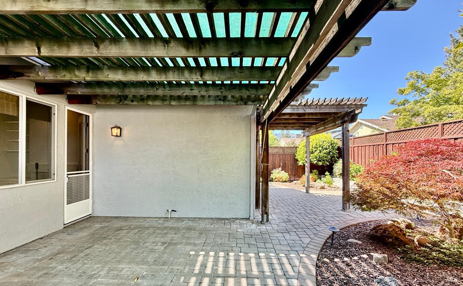 844 Signorelli Circle St. Helena, CA 94574 - Photo 27 of 32 a view of a porch with a table and chairs