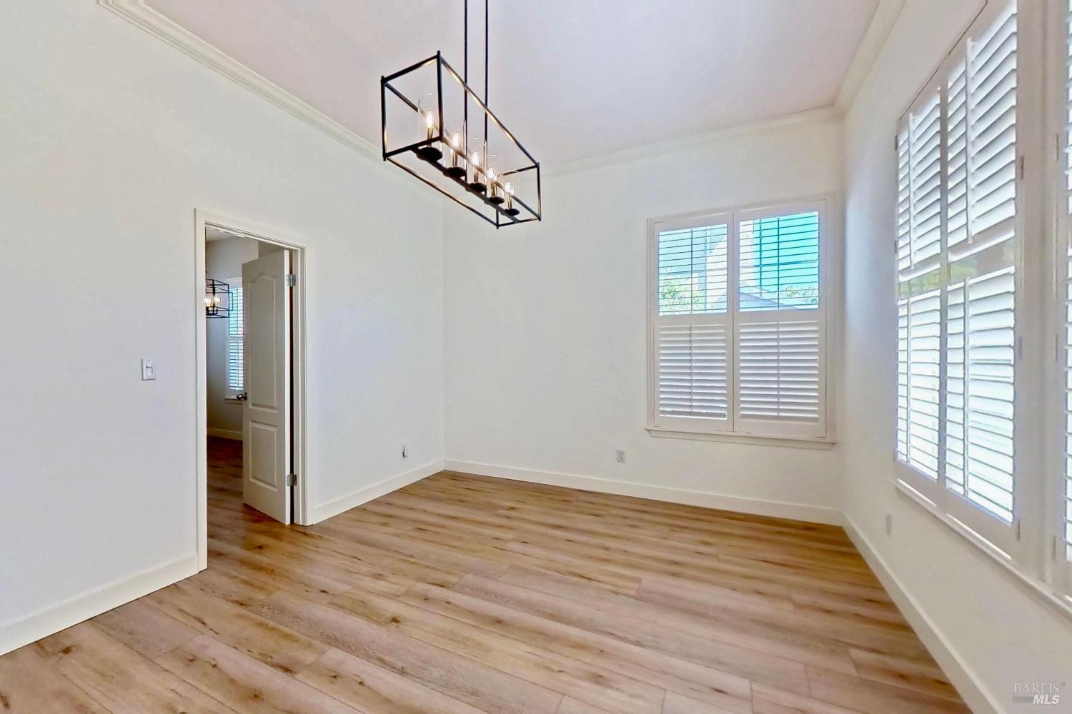 844 Signorelli Circle St. Helena, CA 94574 - Photo 4 of 32 wooden floor in an empty room with a window