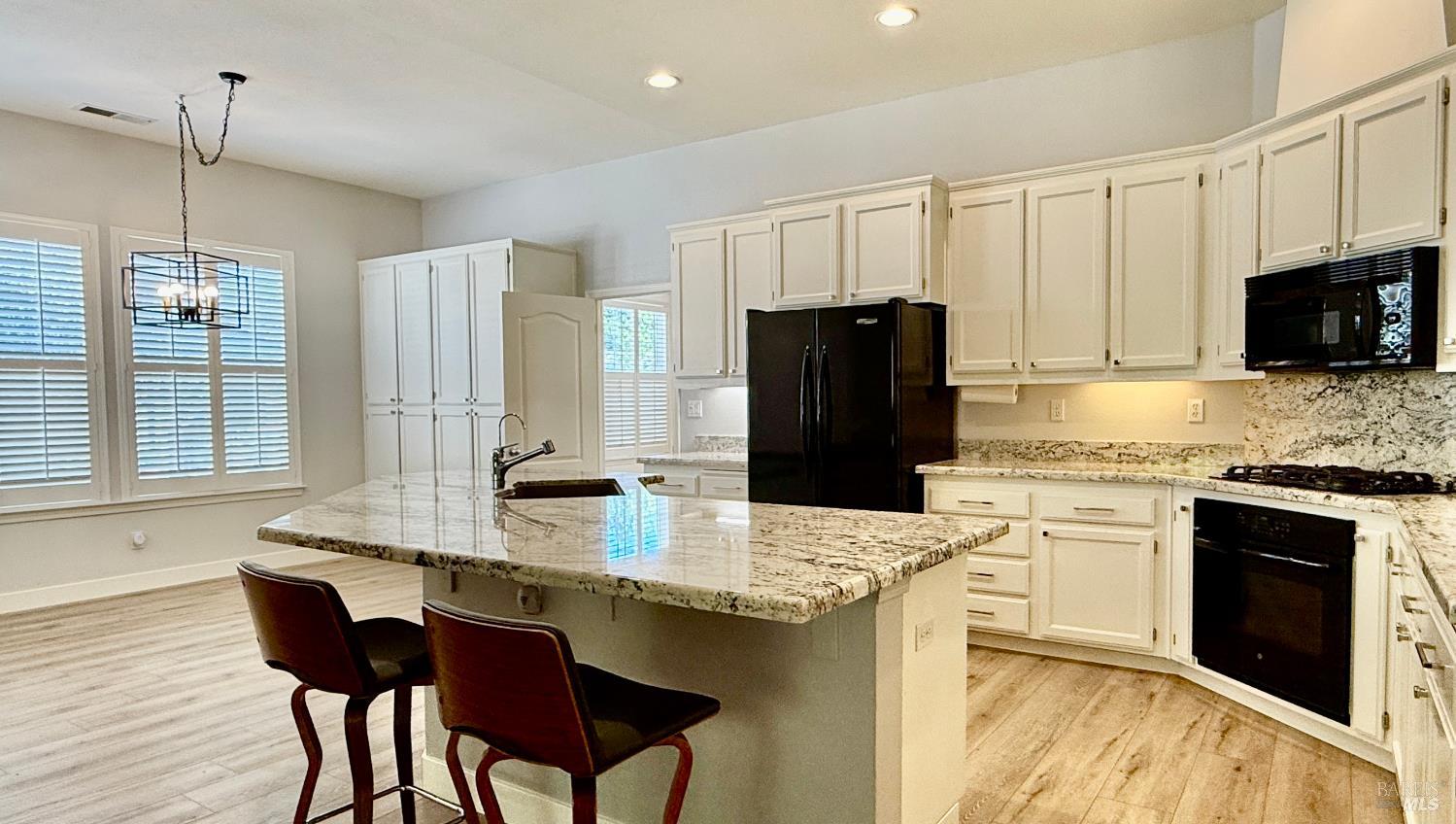 844 Signorelli Circle St. Helena, CA 94574 - Photo 9 of 32 a kitchen with stainless steel appliances granite countertop a sink stove and refrigerator