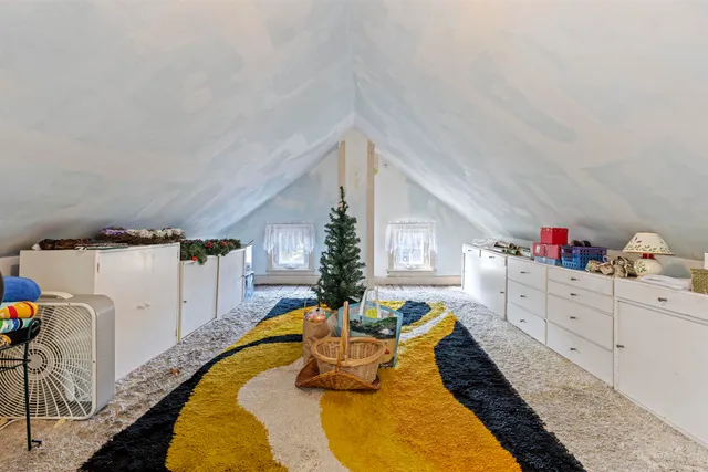 a very nice looking room with a white bed