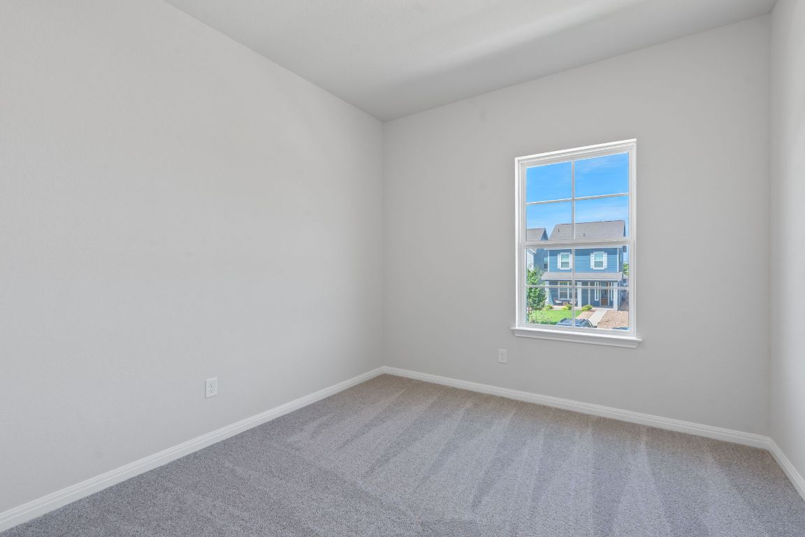 376 Blue Oasis Lane Leander, TX 78641 - Photo 23 of 27 an empty room with a window