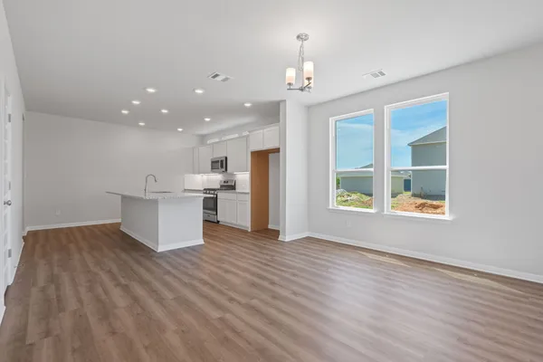 a view of kitchen and front door