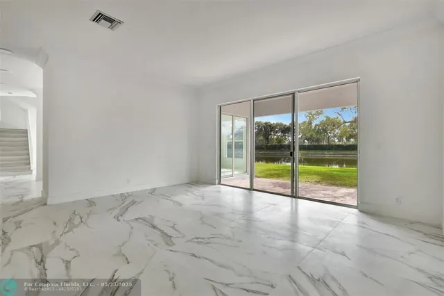 a bathroom with a double vanity sink and a bathtub