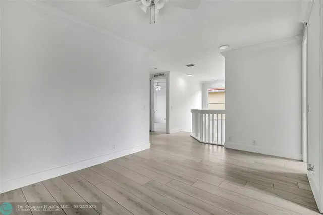 a bathroom with a bathtub and window
