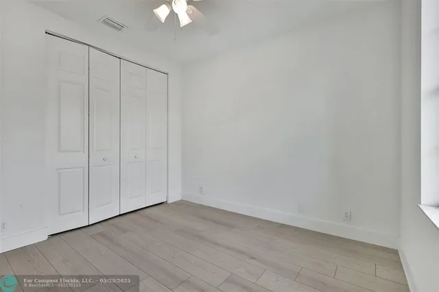 an aerial view of lake residential house with outdoor space and seating