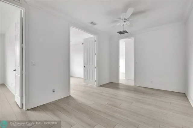 a view of a lake with houses in the background