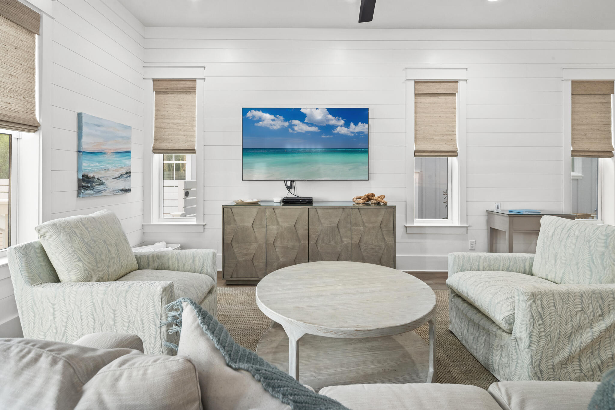 70 Trigger Trail East Inlet Beach, FL 32461 - Photo 19 of 67 a living room with furniture a rug and wall paintings