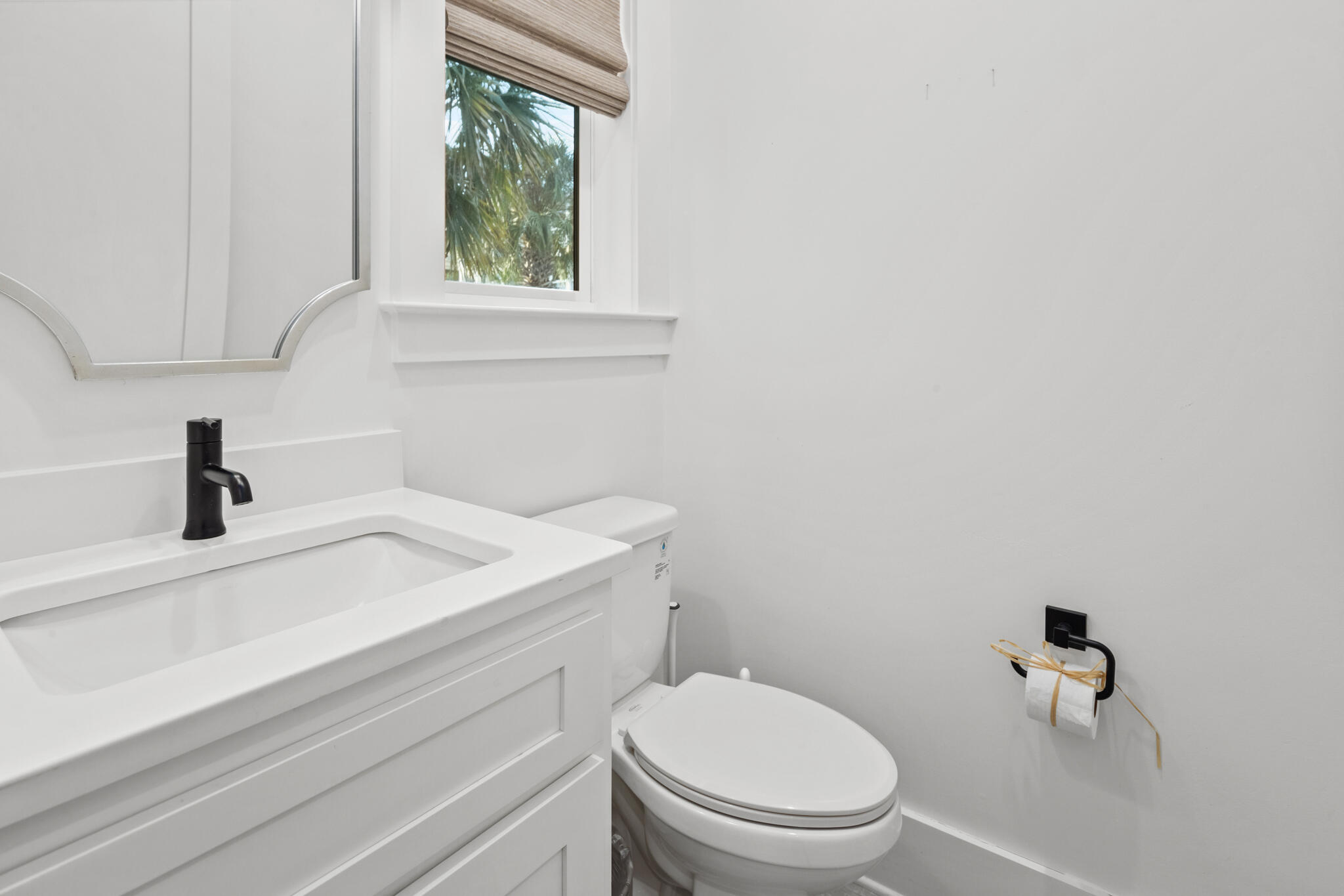 70 Trigger Trail East Inlet Beach, FL 32461 - Photo 20 of 67 a bathroom with a sink a toilet and a window