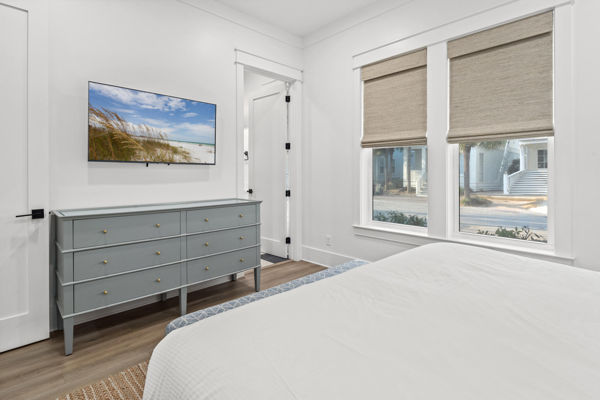 70 Trigger Trail East Inlet Beach, FL 32461 - Photo 23 of 67 a bedroom with a bed and a painting on the wall