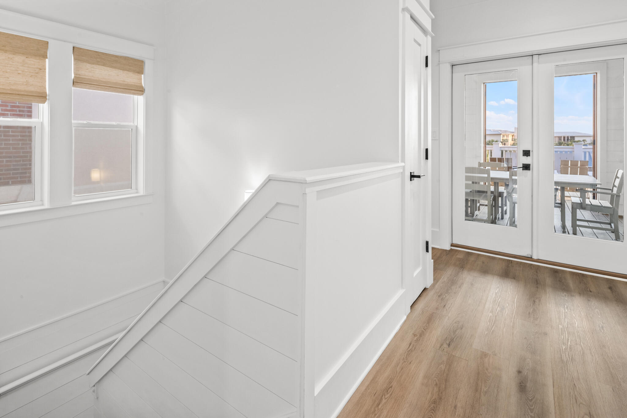 70 Trigger Trail East Inlet Beach, FL 32461 - Photo 44 of 67 a view of a hallway with wooden floor and staircase