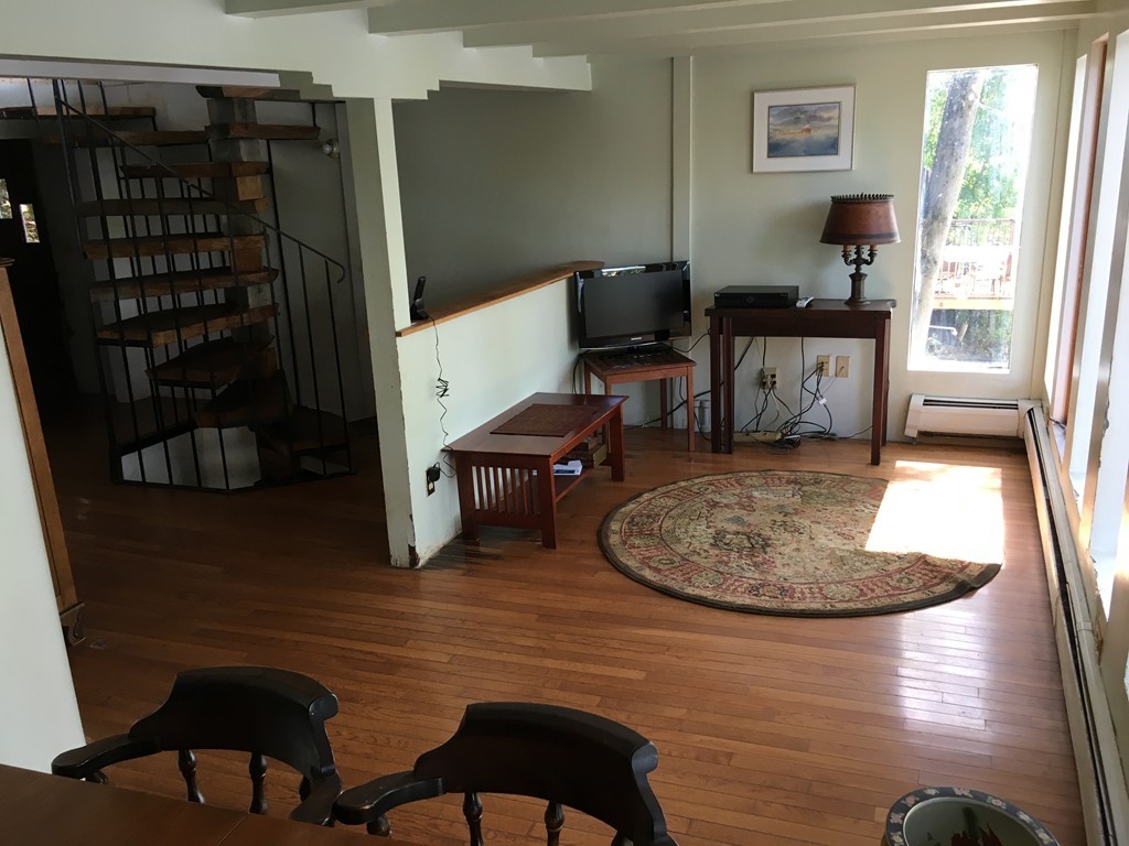 204 Buckland Road Ashfield, MA 01330 - Photo 16 of 30 a living room with furniture and a window