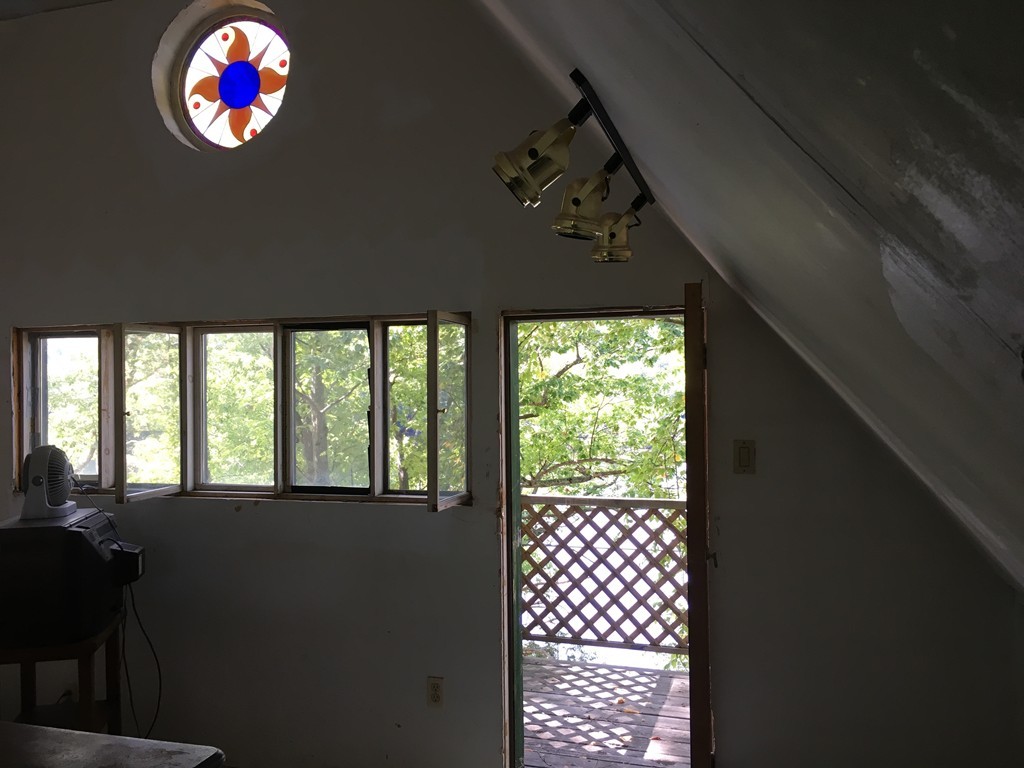 204 Buckland Road Ashfield, MA 01330 - Photo 20 of 30 a view of an empty room with a window
