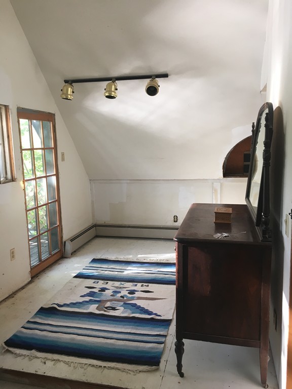 204 Buckland Road Ashfield, MA 01330 - Photo 23 of 30 a view of piano and utility room with windows