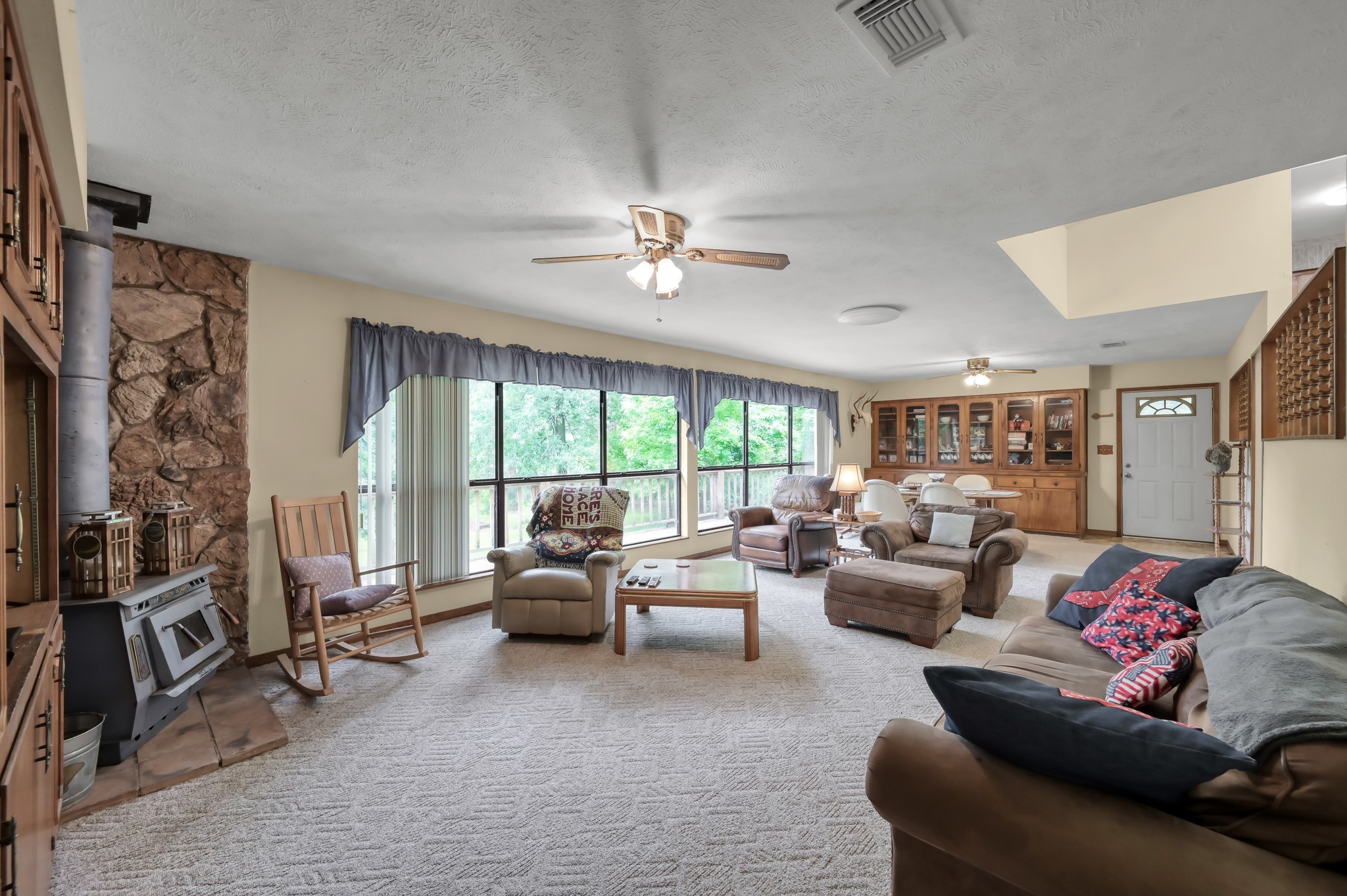254 Sharp Lane Trinity, TX 75862 - Photo 11 of 36 a living room with furniture and a large window