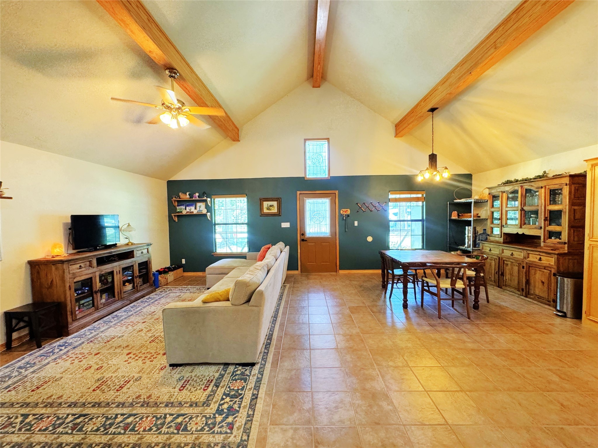 798 Port Boulevard Trinity, TX 75862 - Photo 8 of 31 a living room with patio furniture and a flat screen tv
