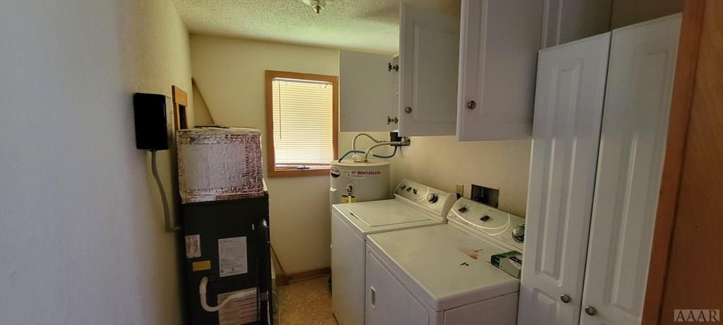 9010 South Old Oregon Inlet Road Nags Head, NC 27959 - Photo 17 of 34 LOWER FLOOR LAUNDRY ROOM