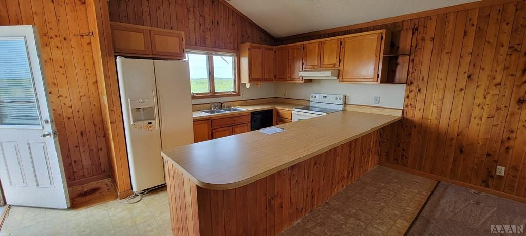 9010 South Old Oregon Inlet Road Nags Head, NC 27959 - Photo 23 of 34 KITCHEN W/ VIEW OF DOOR TO REAR BALCONY