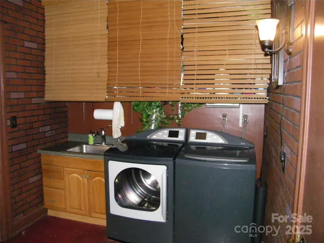 a bedroom with a bed and a rug