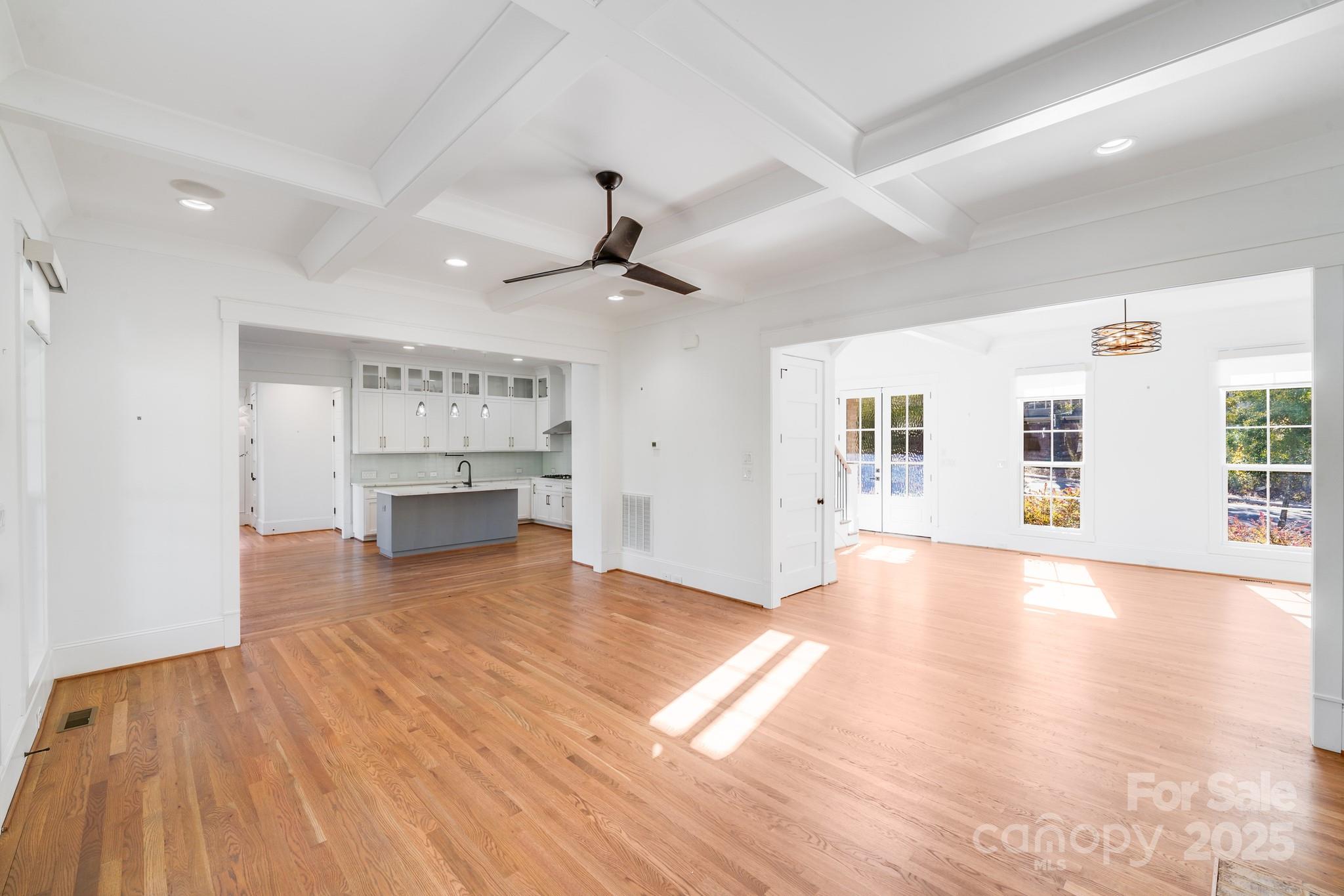 6541 Gardner Lane Charlotte, NC 28270 - Photo 11 of 47 a view of an empty room with window and wooden floor