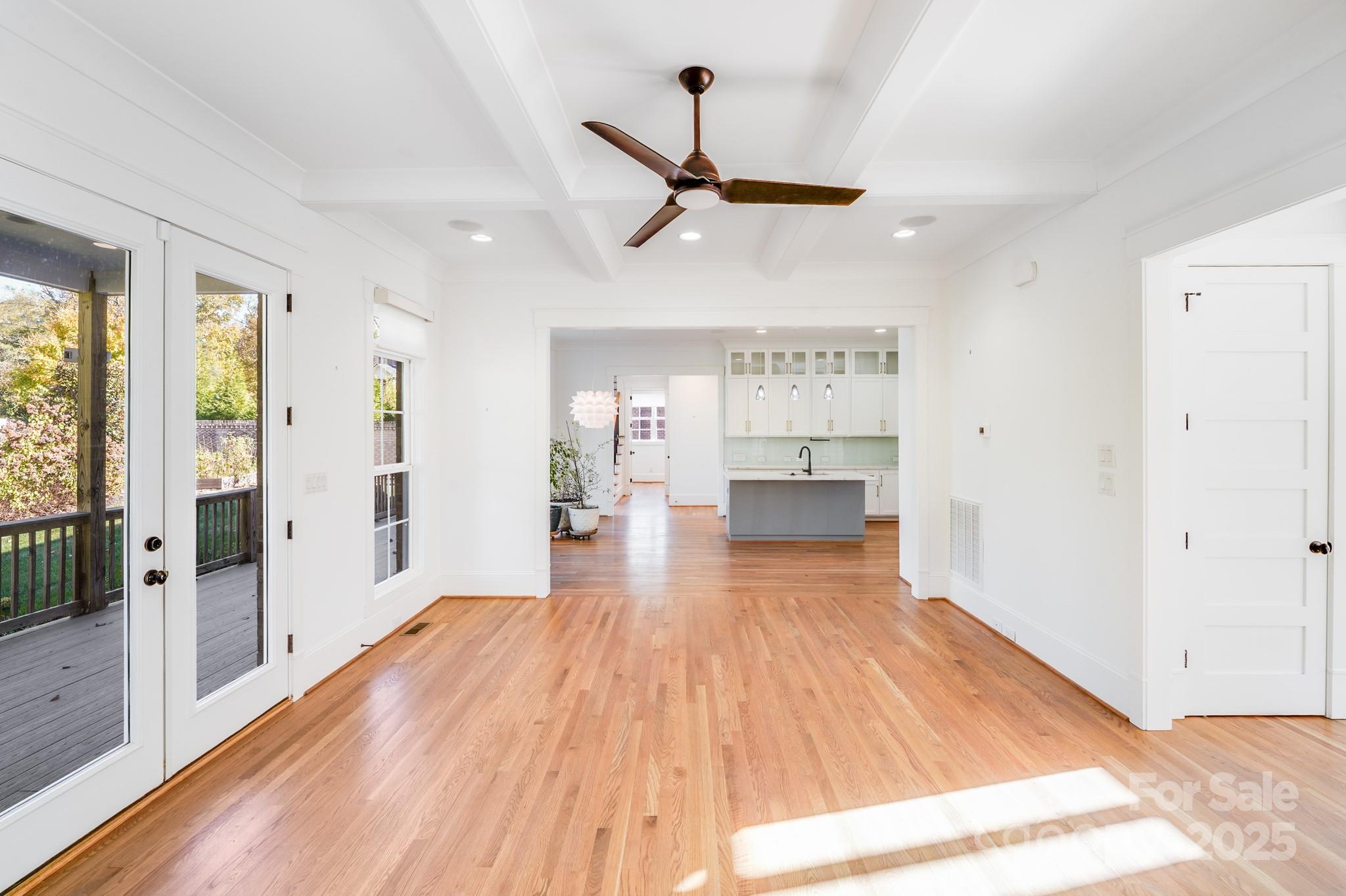 6541 Gardner Lane Charlotte, NC 28270 - Photo 15 of 47 a view of a living room with wooden floor and windows