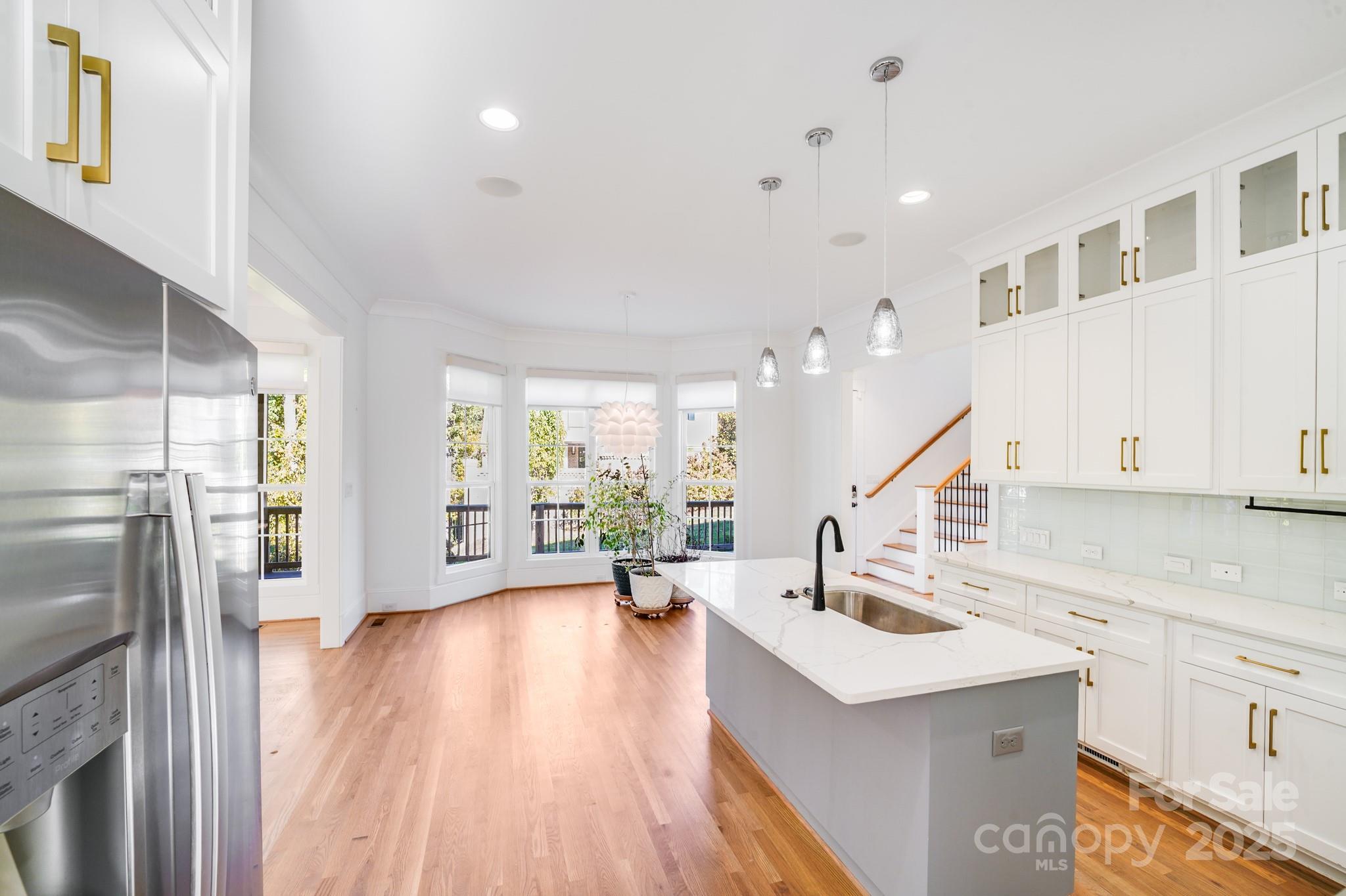 6541 Gardner Lane Charlotte, NC 28270 - Photo 18 of 47 a view of kitchen with sink and refrigerator