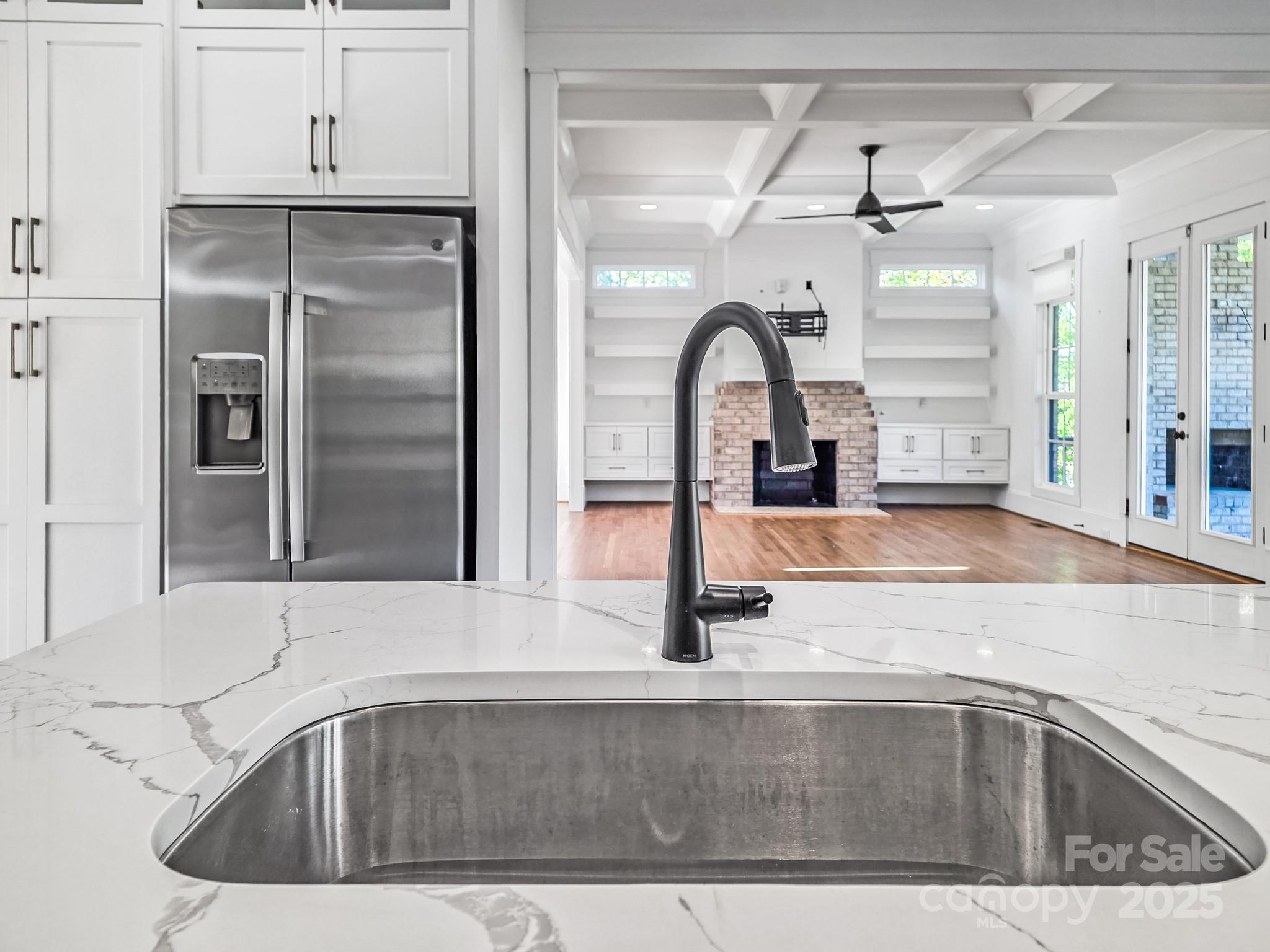 6541 Gardner Lane Charlotte, NC 28270 - Photo 21 of 47 a kitchen with a sink and a refrigerator