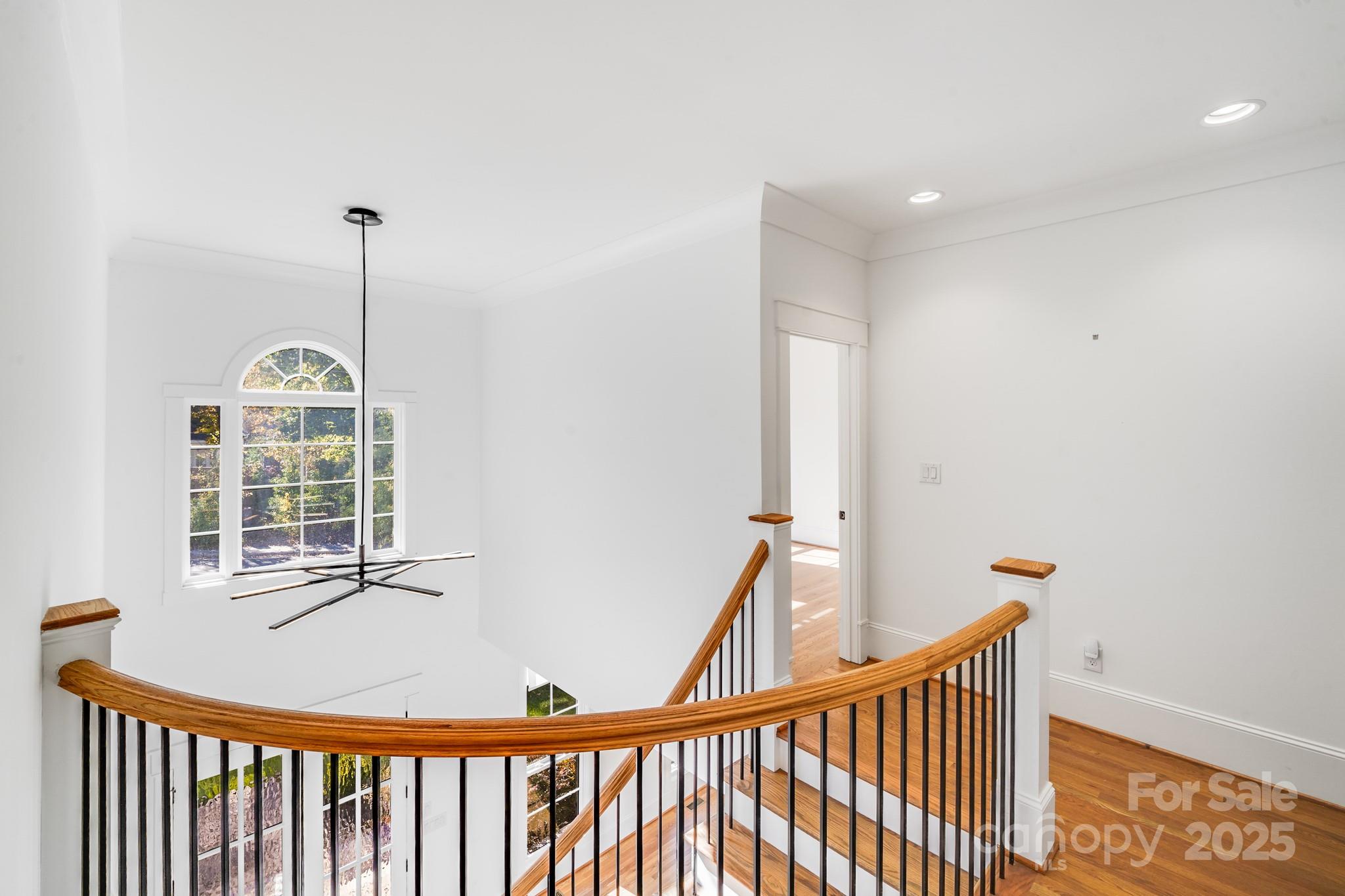 6541 Gardner Lane Charlotte, NC 28270 - Photo 34 of 47 a view of a hallway with windows