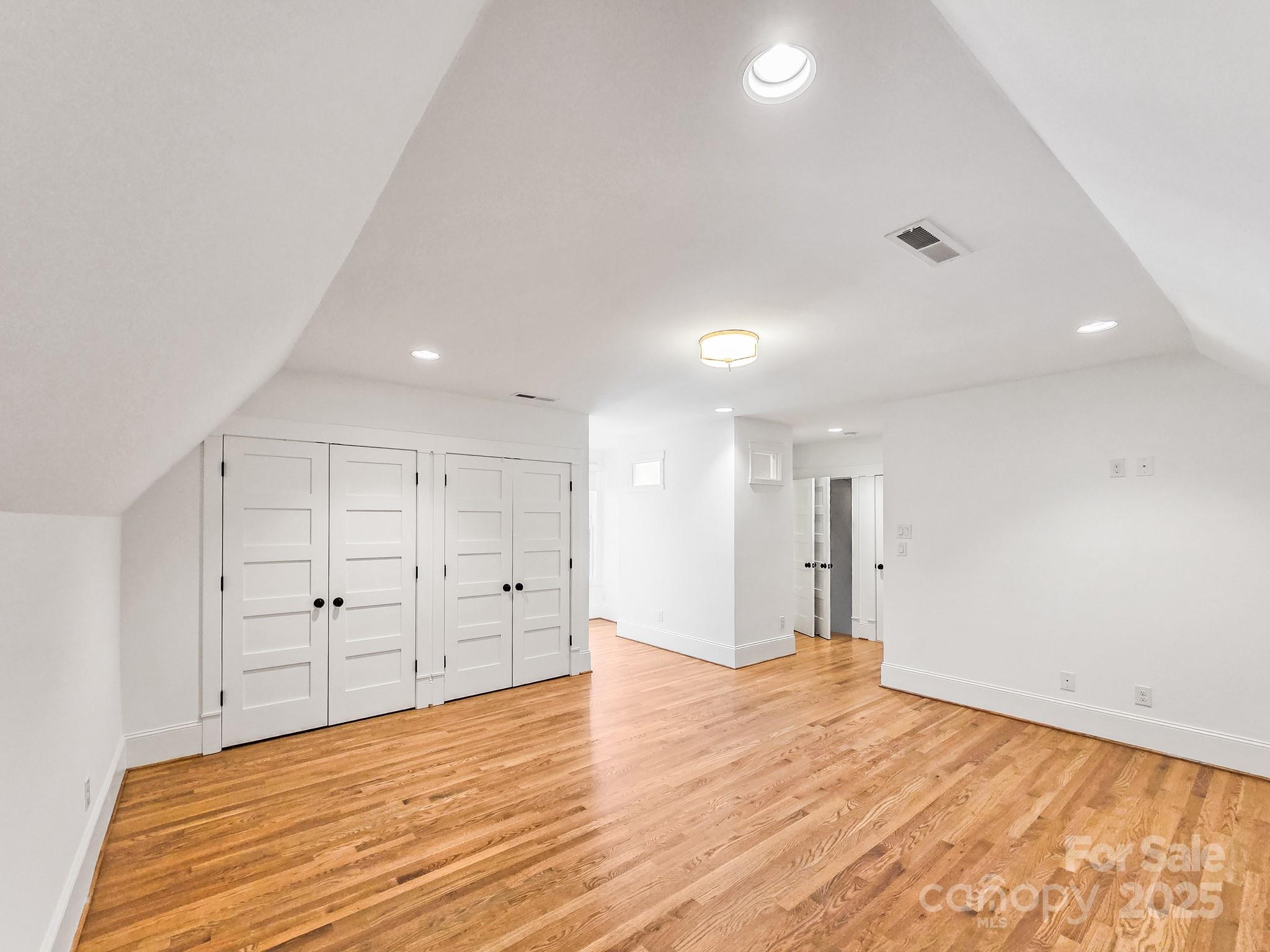 6541 Gardner Lane Charlotte, NC 28270 - Photo 38 of 47 a view of empty room with wooden floor
