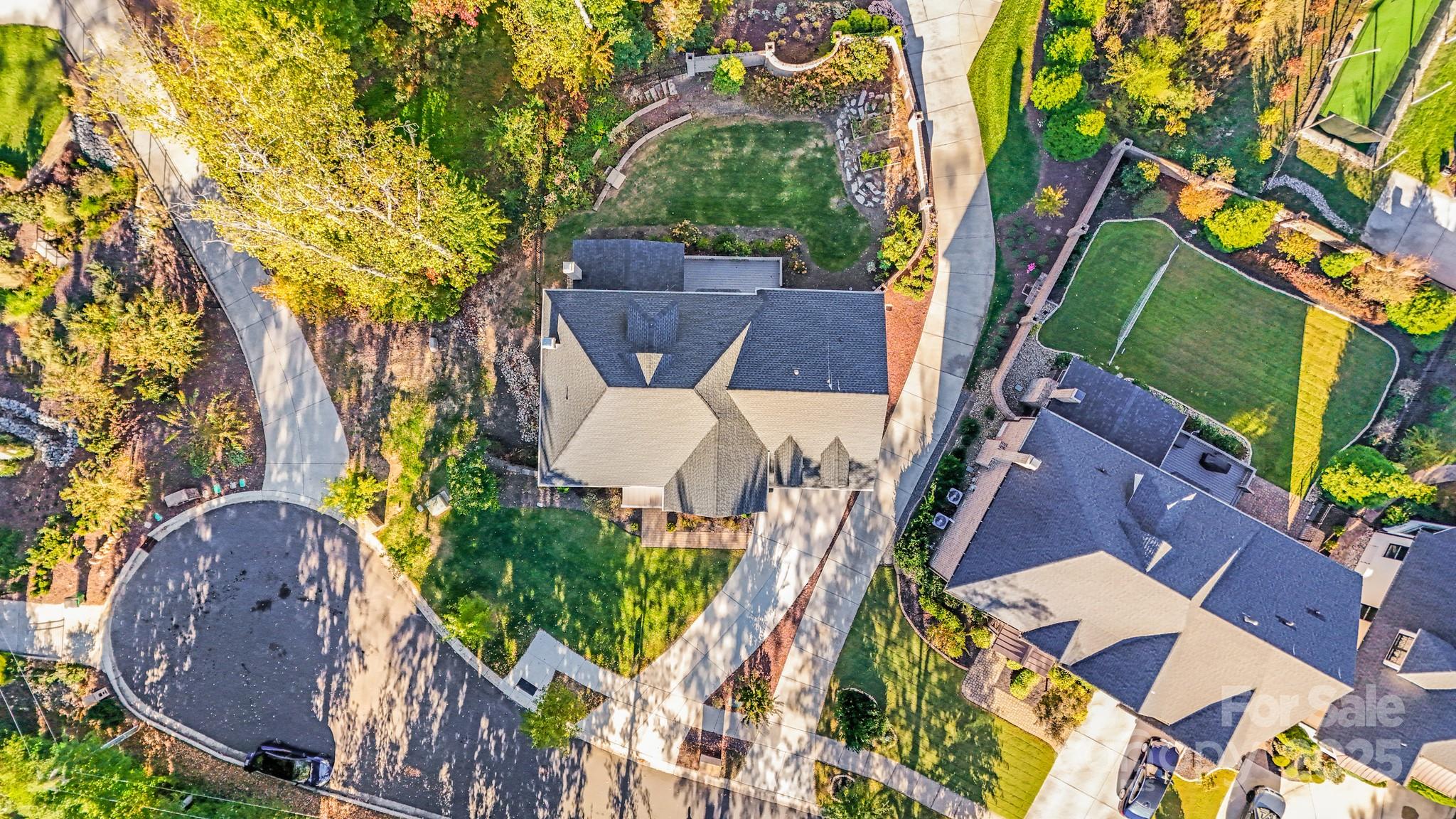 6541 Gardner Lane Charlotte, NC 28270 - Photo 43 of 47 an aerial view of a house with garden space and street view