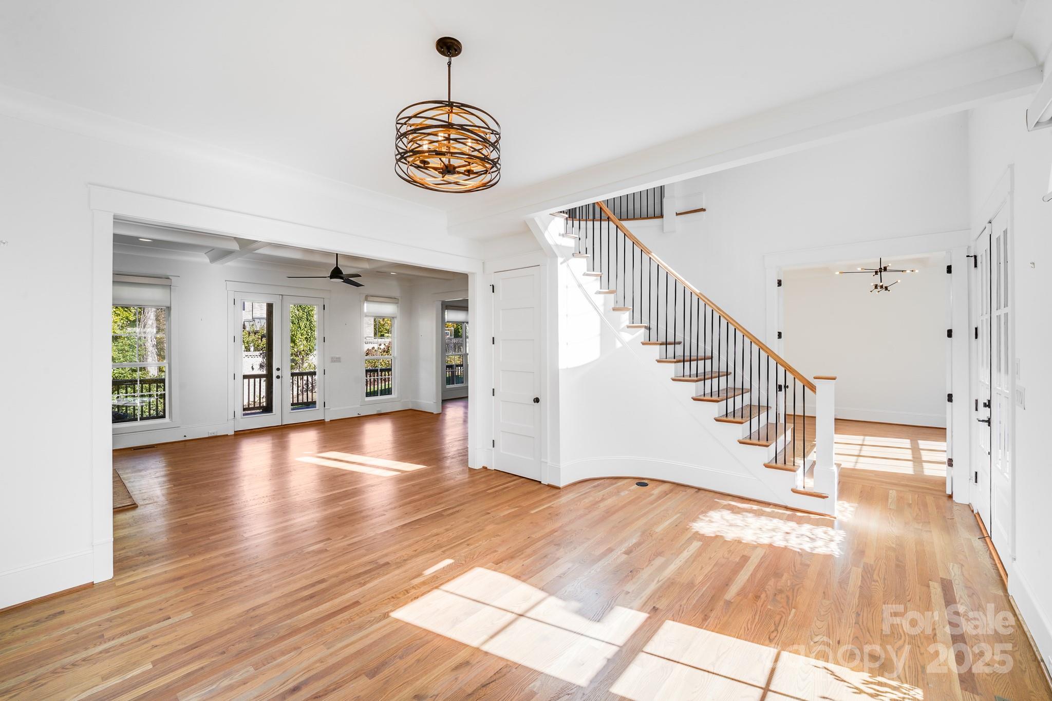 6541 Gardner Lane Charlotte, NC 28270 - Photo 9 of 47 a view of an entryway with wooden floor