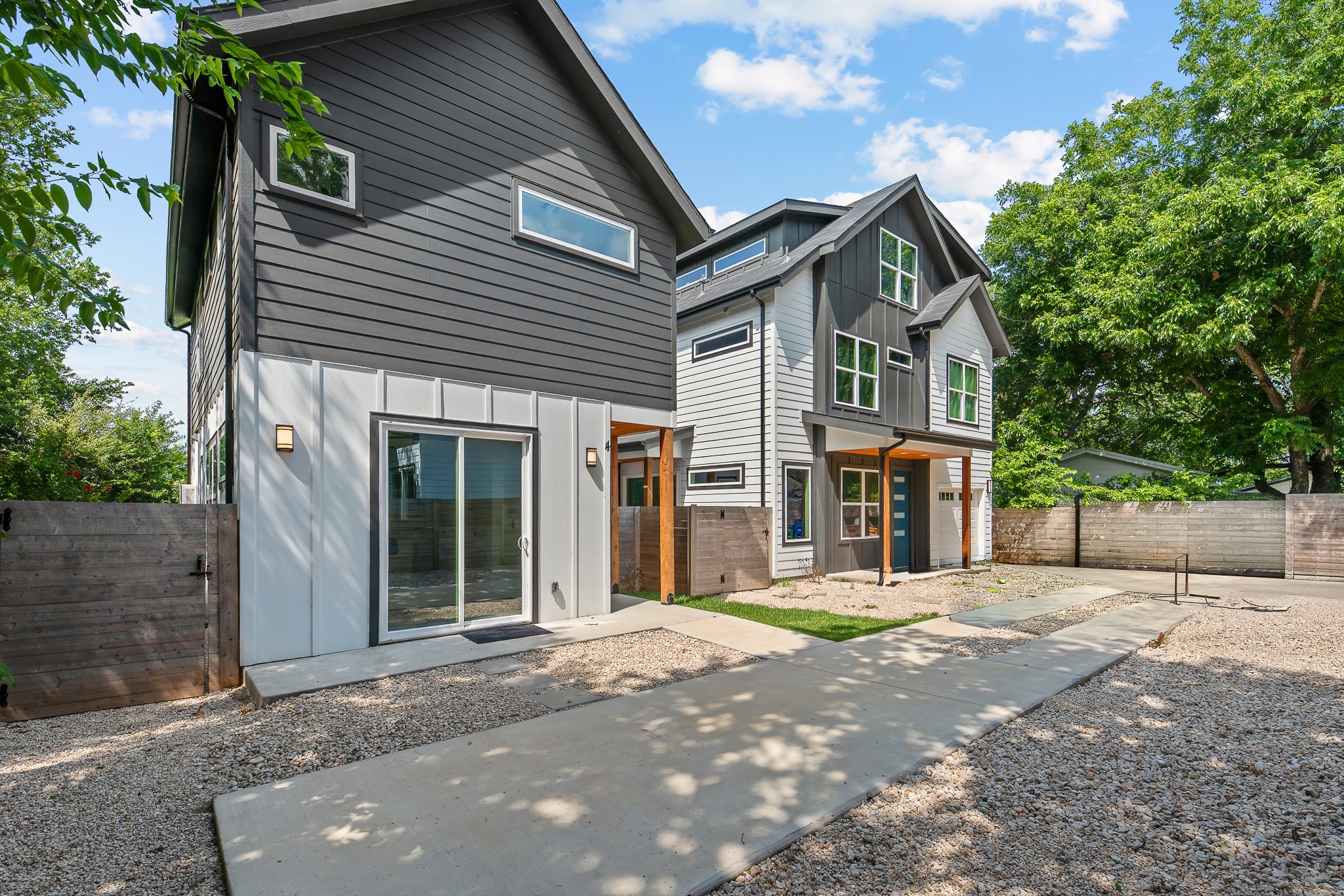 5305 Ledesma Road, Unit 4 Austin, TX 78721 - Photo 38 of 40 Modern townhomes showcasing sharp architectural lines and contrasting siding.
